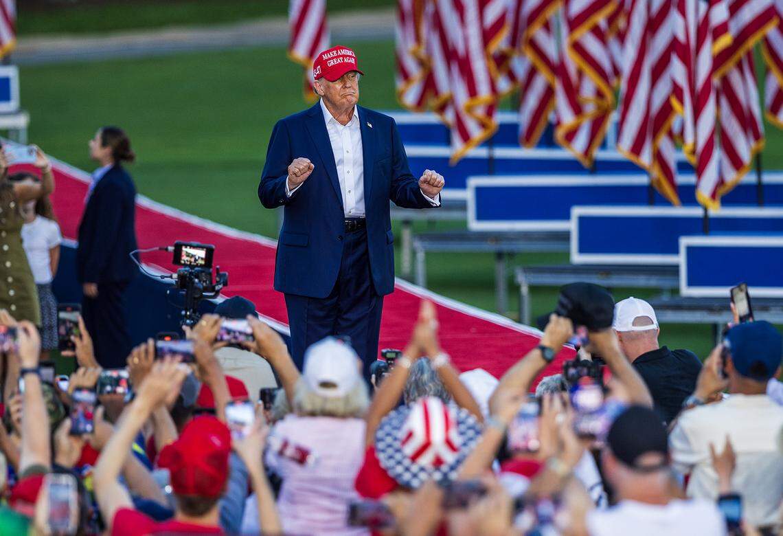 Former President Donald Trump reacts as he arrives to the stage during a rally at the Trump National Doral Miami, in Doral on Tuesday, July 09, 2024.
