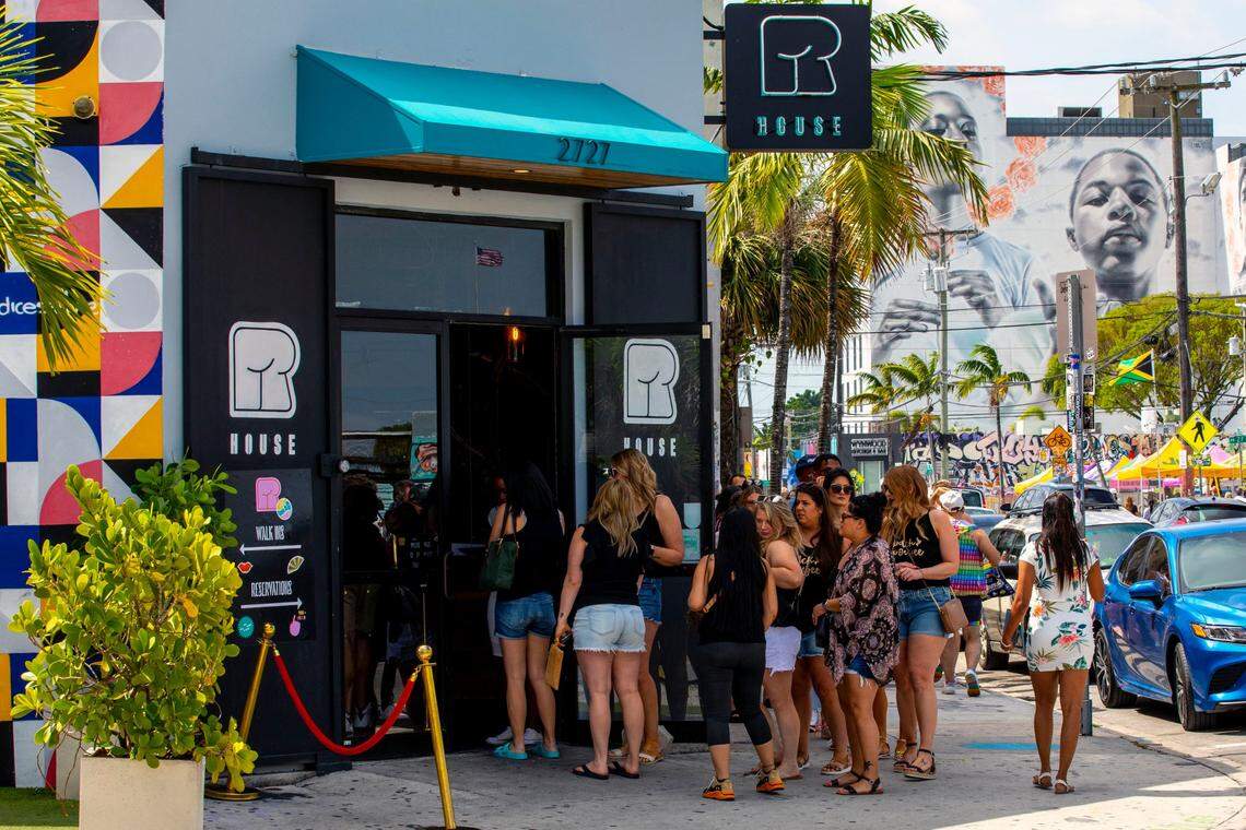 People wait in line to check into their reservations for a Drag Brunch at R House Wynwood in Miami, Florida, on Saturday, April 9, 2022.