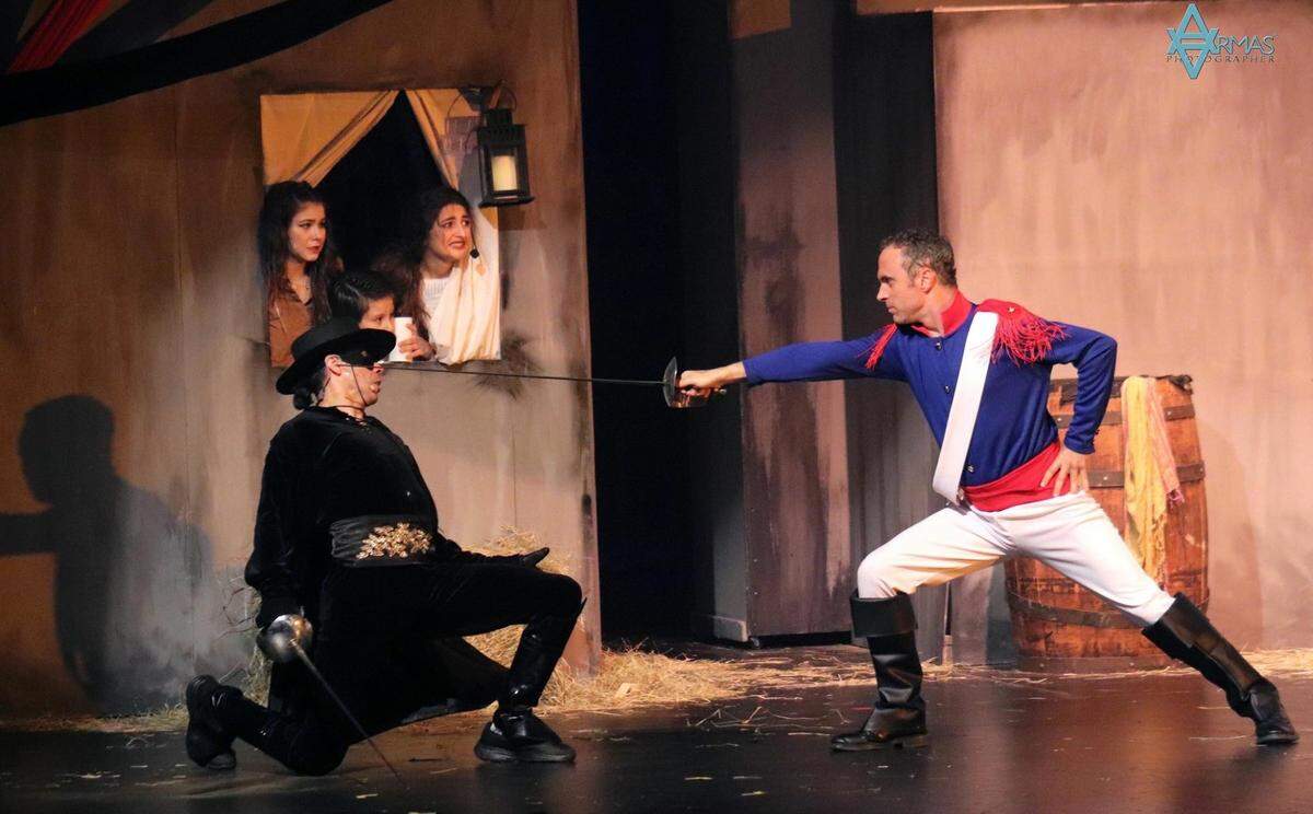 Seth Trucks as the alcalde’s lieutenant gets ready to take out Lito Becerra’s Zorro in “Zorro the Musical” at Miami Theater Center.