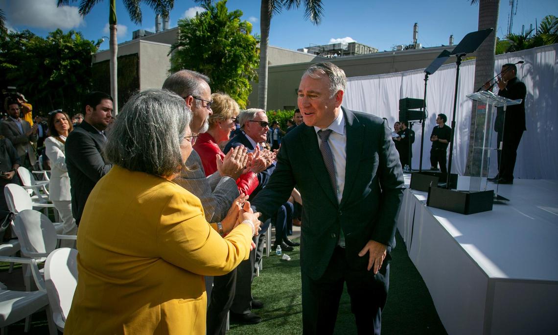 Miami, FL- January 31, 2023 - Ken Griffin, right, greets Miami-Dade County Mayor Daniella Levine Cava, left, on his way to the podium to speak to dignitaries and guests in Nicklaus Children’s Hospital Advanced Pediatric Care Pavilion Courtyard. Billionaire Citadel founder and CEO Ken Griffin donated $25 million to Nicklaus Children’s to support the new five-story, 127,000-square-foot surgical tower opening in 2024. The tower will be named the Kenneth C. Griffin Surgical Tower.