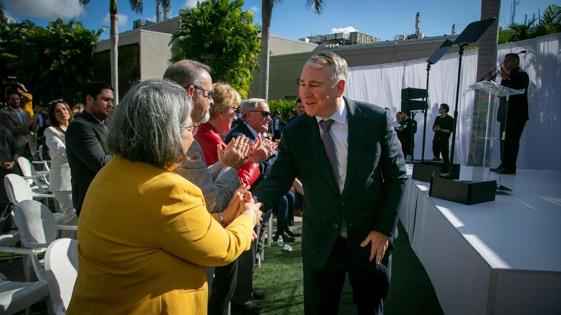Ken Griffin, right, greets Miami-Dade County Mayor Daniella Levine Cava on his way to the podium at Nicklaus Children’s Hospital Advanced Pediatric Care Pavilion Courtyard on Tuesday, Jan. 31, 2023. Griffin, the billionaire Citadel founder and CEO, donated $25 million to Nicklaus Children’s Hospital to support a five-story, 127,000-square-foot surgical tower opening in 2024. The tower will be named the Kenneth C. Griffin Surgical Tower.