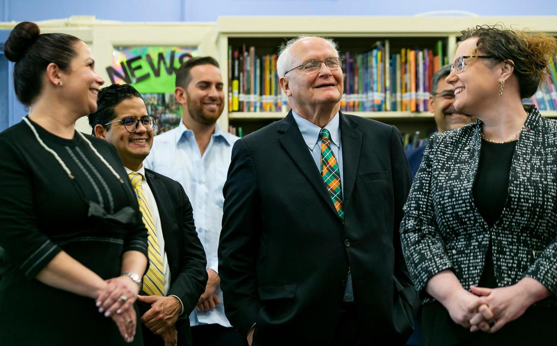David Lawrence Jr., center, reacts during a press conference where Governor Ron DeSantis signed bills revamping Florida’s literacy and early childhood learning in West Miami Middle School in Miami on Tuesday, May 4, 2021.