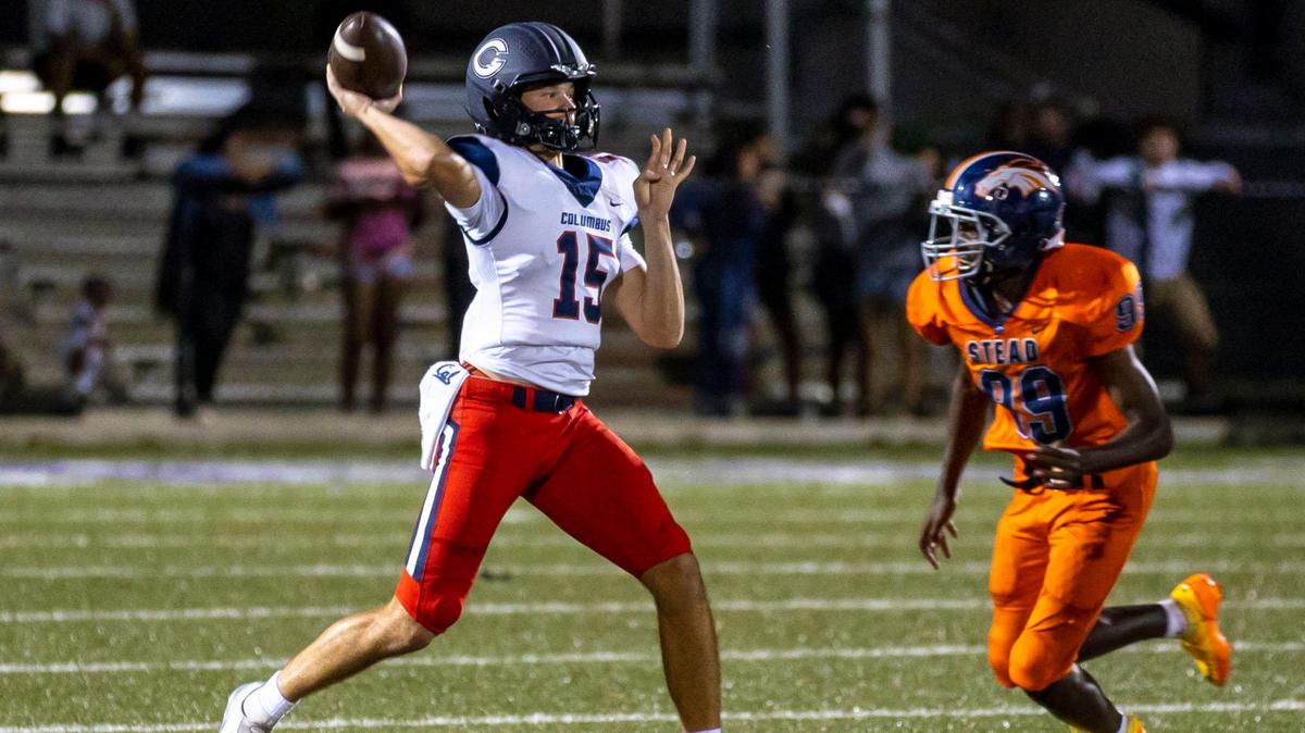 Columbus quarterback Alberto Mendoza (15) throws the ball while chased by Homestead defensive end Jerry Kavaursea (99) during the first half of a high school football game at Harris Field Stadium in Homestead, Florida, on Friday, October 7, 2022.