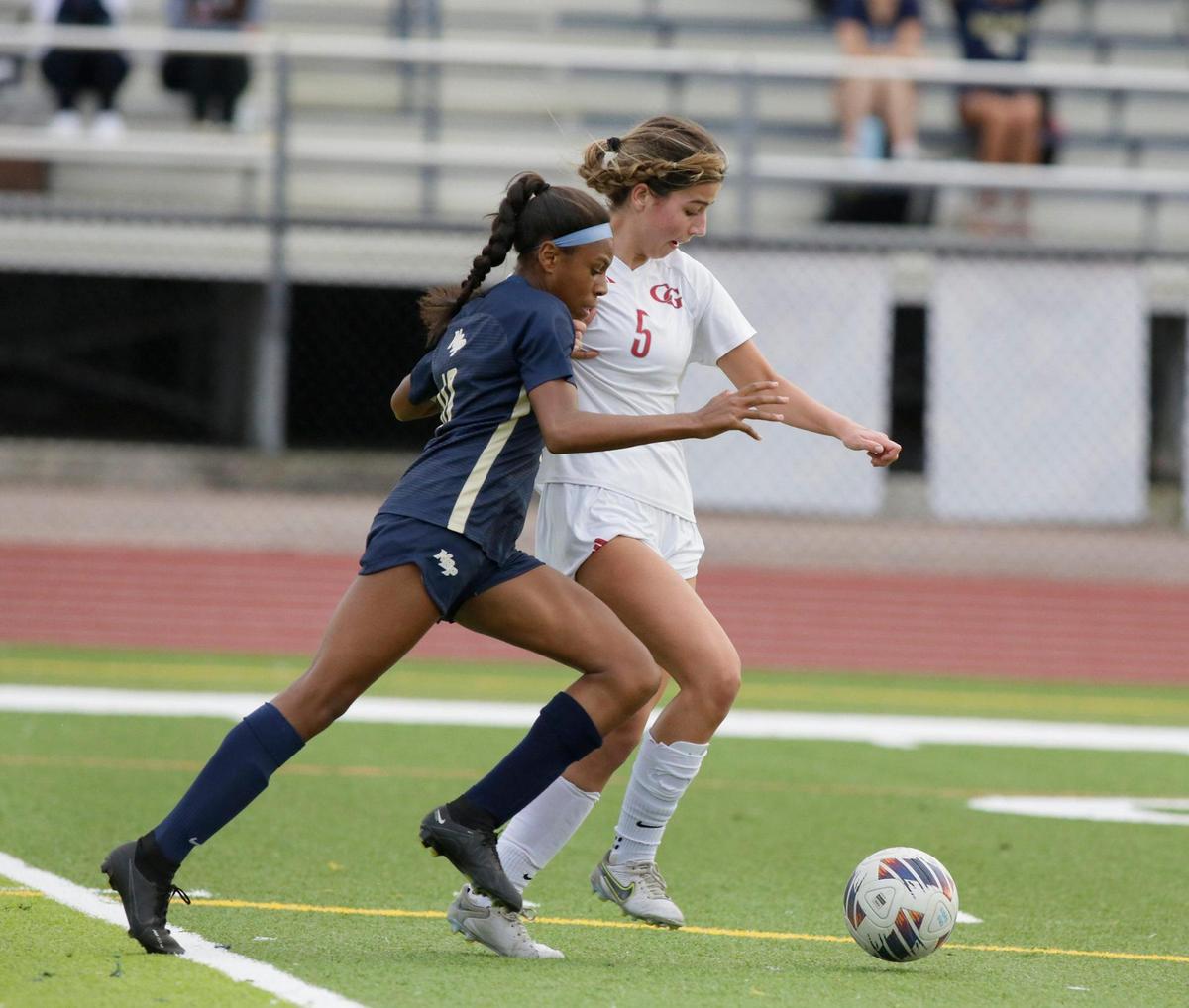 North Broward Prep School Sumayah Brown (10) challanges for the ball Cardinal Gibbons Mia Conard (5) during Region 4-4A girls soccer semifinal game on Friday, February 9, 2024 at North Broward Prep School in Coconut Creek. Andrew Uloza / for Miami Herald