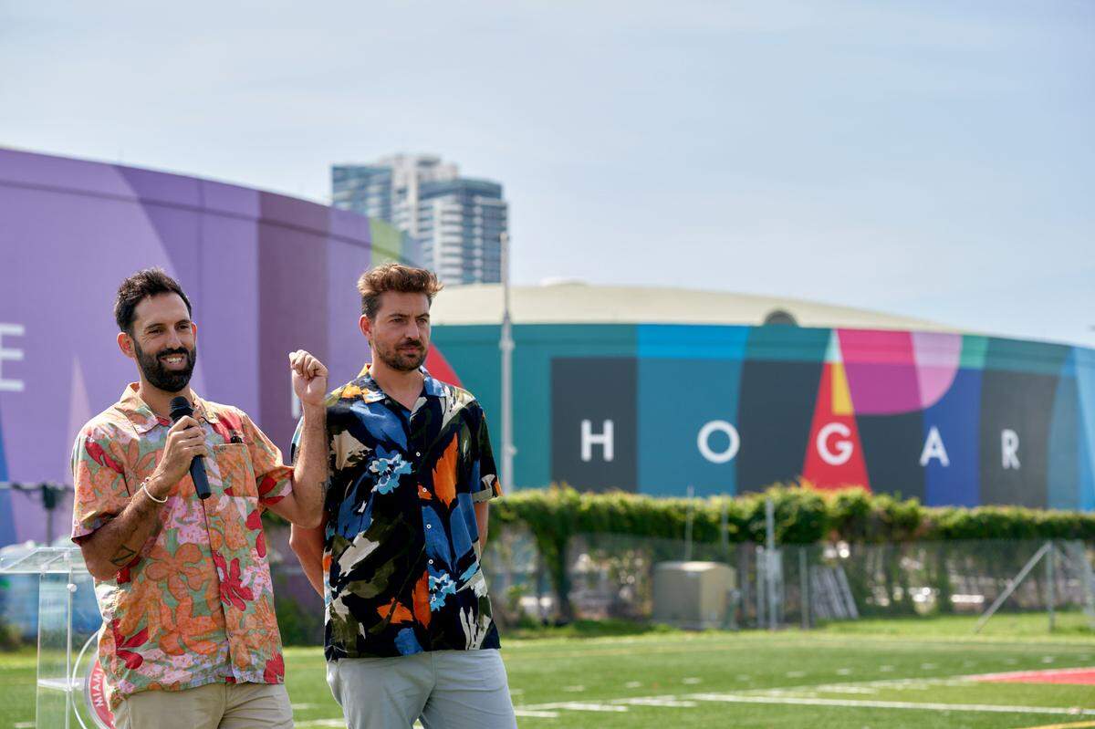 Pablo Ferriero and Juan Jaume, of Boa Mistura, at the unveiling of their latest project, ‘My Home, Mi Hogar,’ which was produced in collaboration with O, Miami and featured one line from a poem written by Miami Beach Senior High School student Valentina Mena.