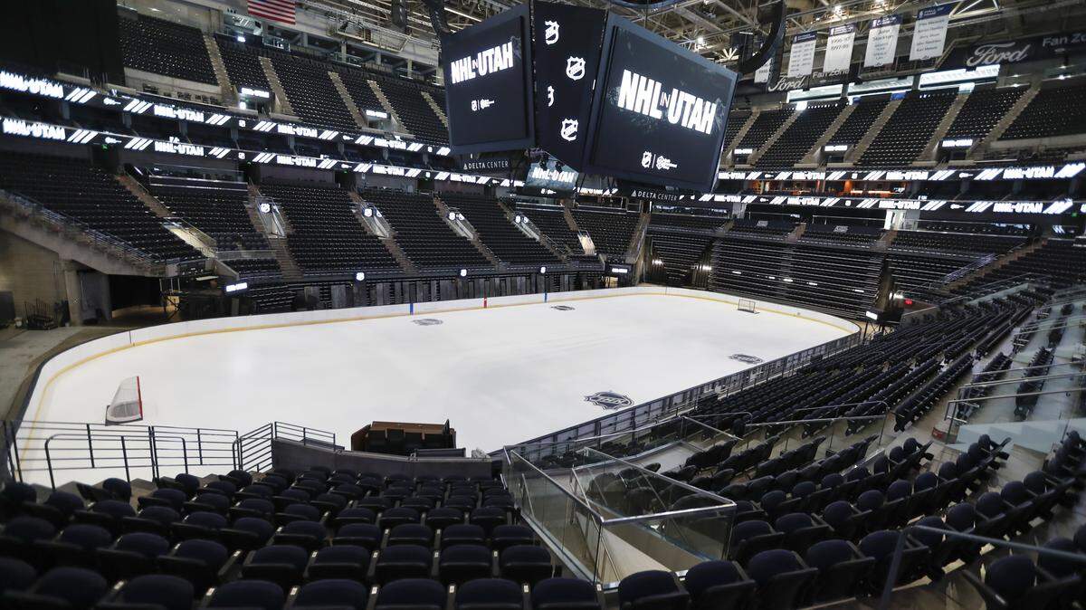 SALT LAKE CITY, UT - APRIL 19: The hockey rink at the Delta Center is seen with the "NHL in Utah" logos appearing on the signage on April 19, 2024 in Salt Lake City, Utah. The NHL has allowed the sale of the Arizona Coyotes and the team will relocate to Salt Lake City, Utah. (Photo by Chris Gardner/Getty Images)