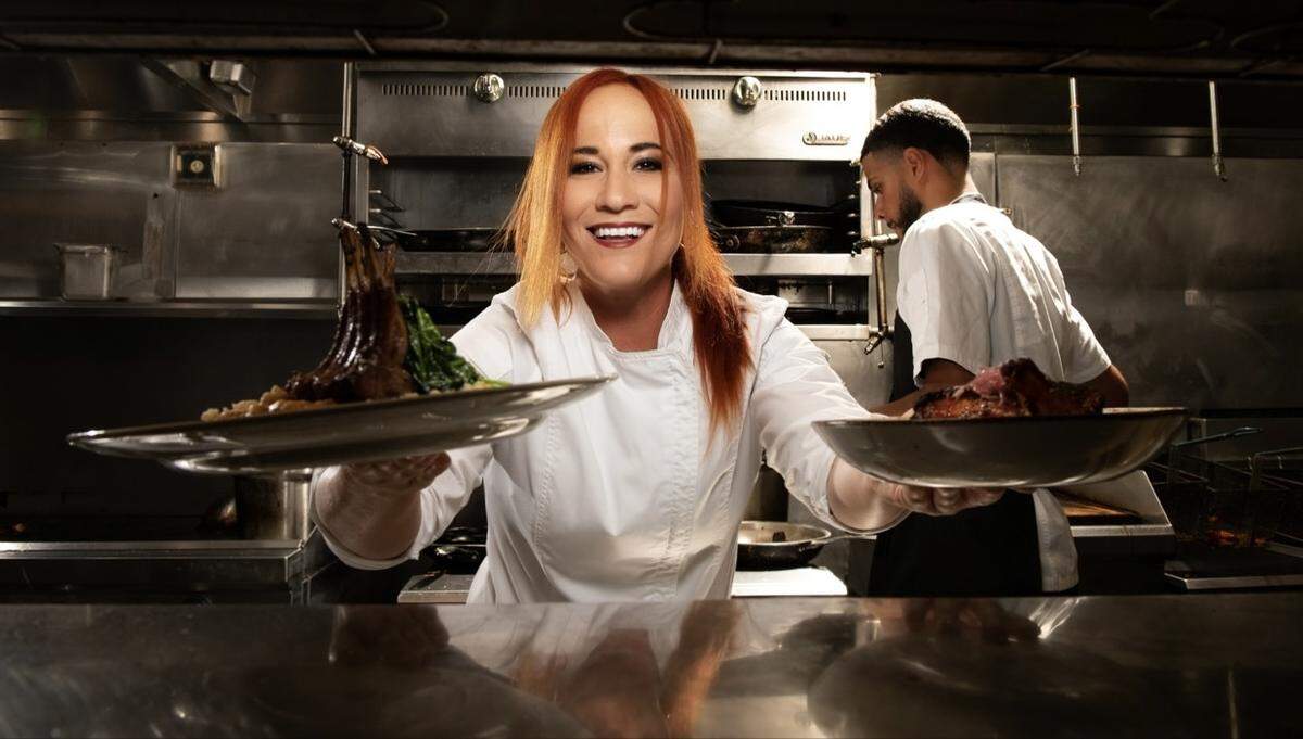 ‘I love it as much as my guests,’ says Chef Adrianne Calvo of the Dark Dining events at Chef Adrianne’s Vineyard Restaurant & Bar in Kendall.