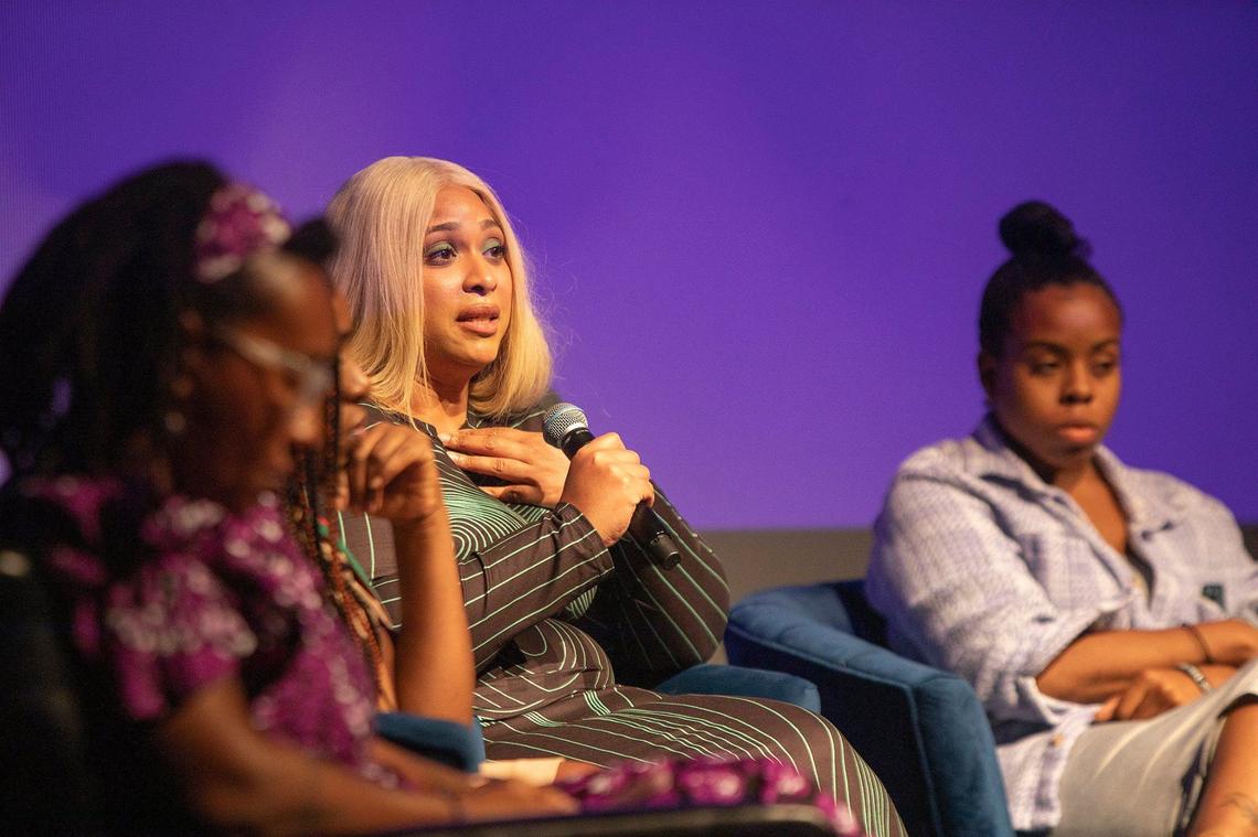 (Center) Marie Gilliam, 37, talks about the closure of the maternity ward at North Shore Hospital during a panel discussion at the Little Haiti Cultural Center on Saturday, April 13, 2024.
