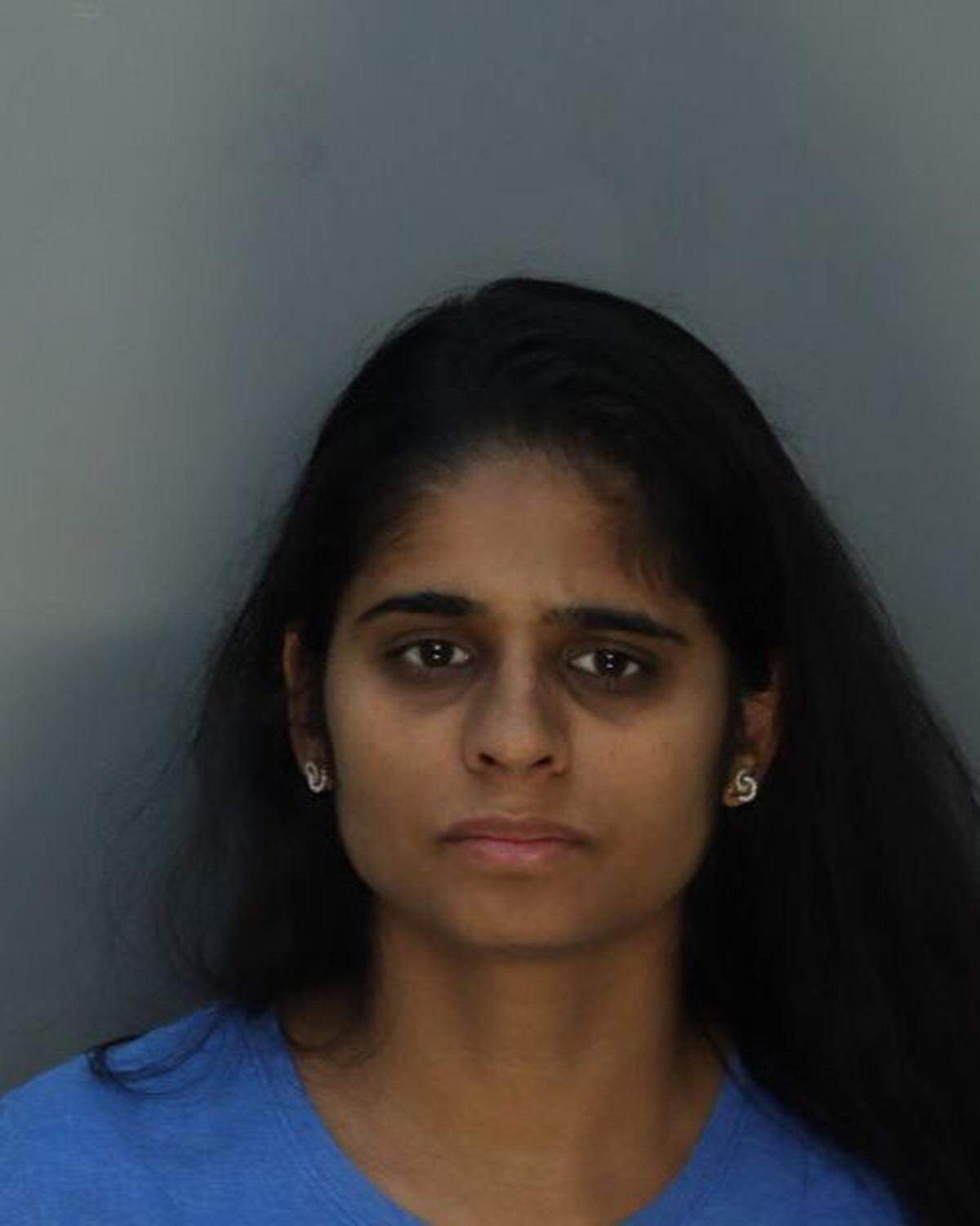 Mugshot of Dr. Neha Gupta, 36, the Oklahoma pediatrician accused of murdering her 4-year-old daughter, Aria Talathi, and staging it as an accidental drowning while staying at their vacation home rental in El Portal.