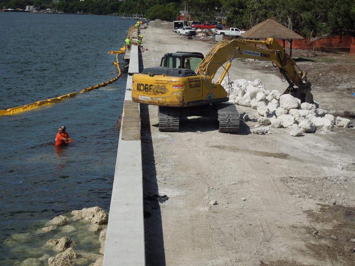 Refurbishment work at Alice Wainwright Park included removal of Australian pines, construction of a new seawall and placement of boulders along the waterfront.