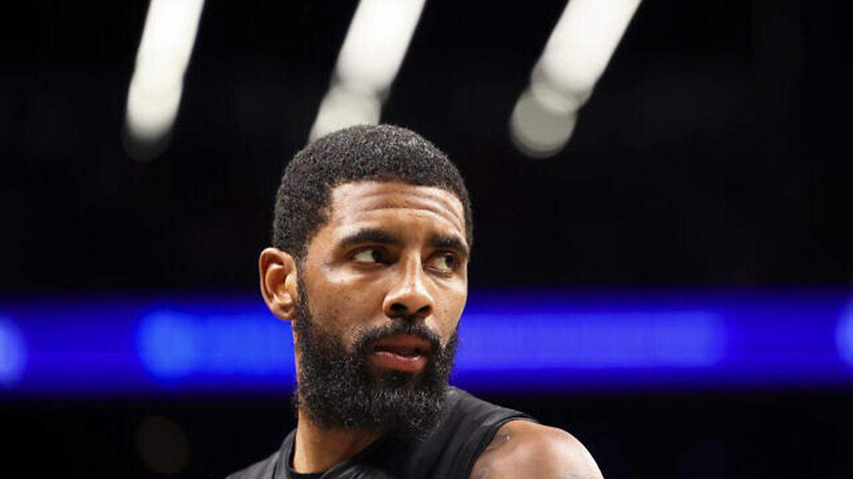 Brooklyn Nets guard Kyrie Irving looks out during the second half of an NBA basketball game against the Indiana Pacers Monday, Oct. 31, 2022, in New York. (AP Photo/Jessie Alcheh)