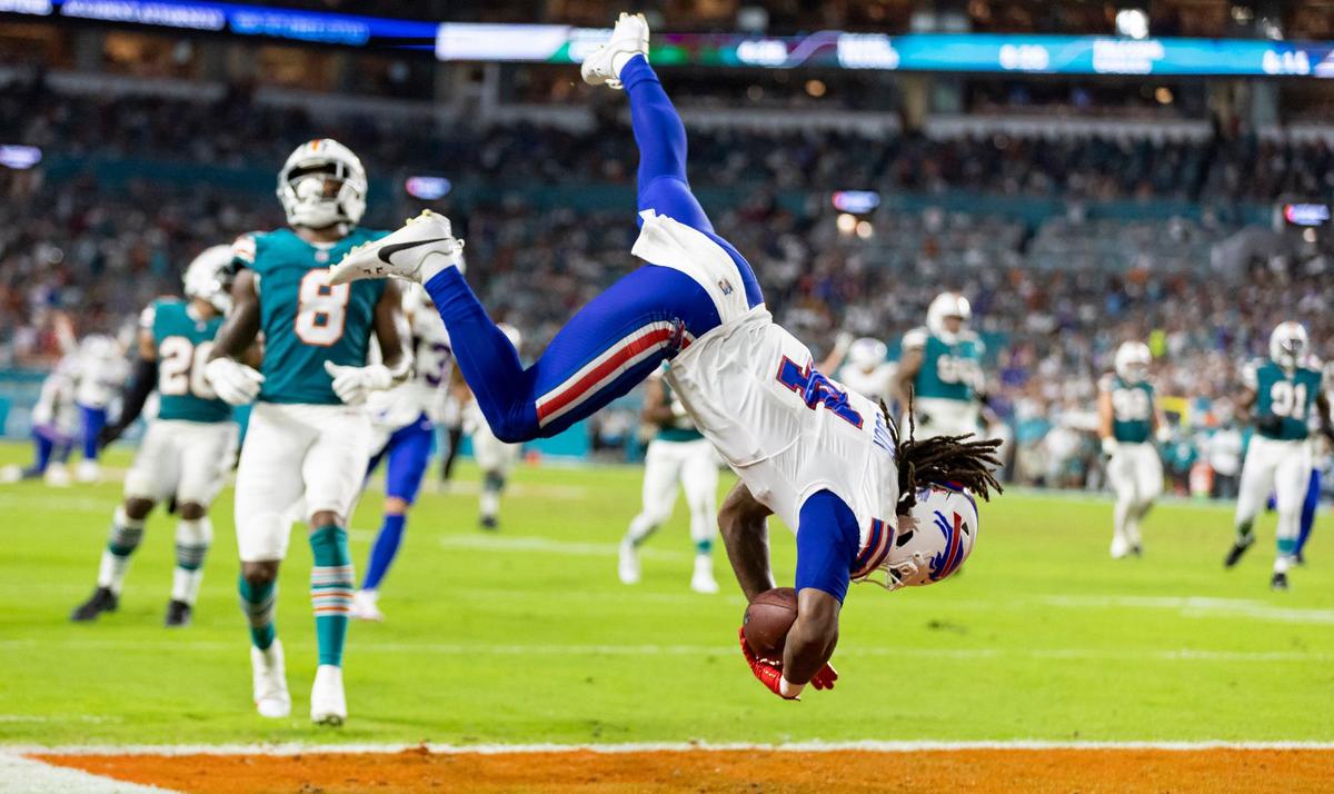 Buffalo Bills running back James Cook (4) scores a touchdown against the Miami Dolphins in the first half of their NFL game at Hard Rock Stadium on Thursday, Sept. 12, 2024, in Miami Gardens, Fla.