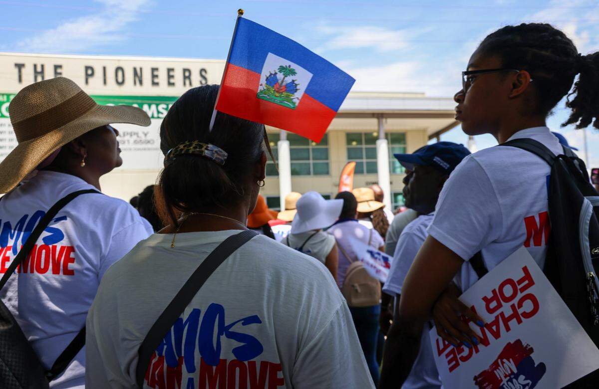 North Miami residents and members of the South Florida Haitian community gather at North Miami High School for the start of the march. About 3,500 people joined Haitians across the U.S. and the world on Sunday, July 9, 2023 to demand relief for Haiti.