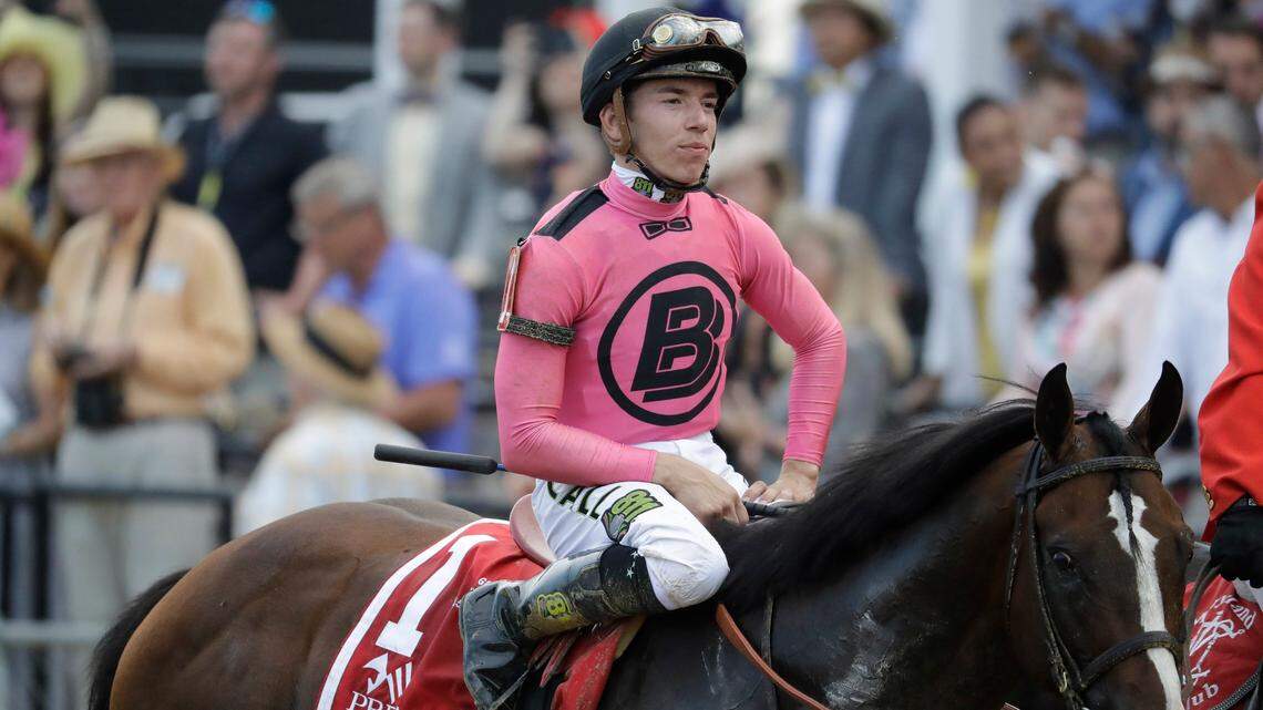 War of Will, ridden by Tyler Gaffalione reacts after crossing the finish line to win the Preakness Stakes horse race at Pimlico Race Course, Saturday, May 18, 2019, in Baltimore.