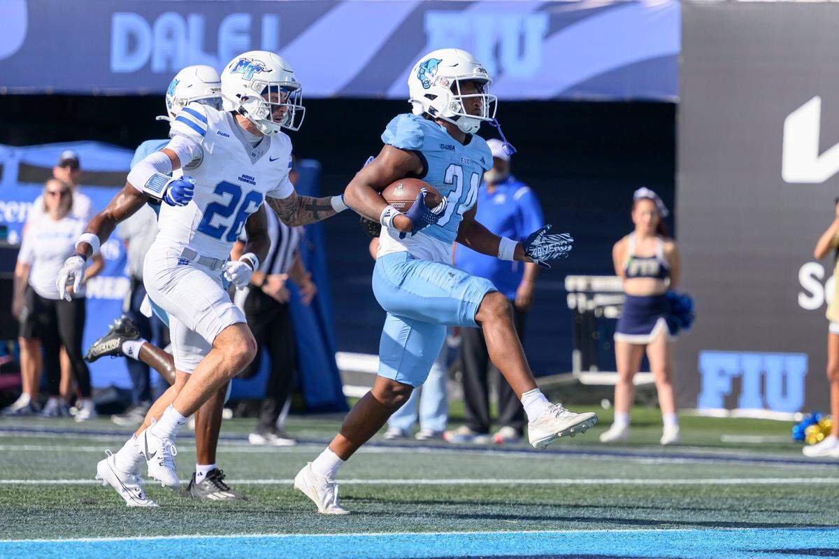 FIU running back Devonte Lyons (34) scores a touchdown during game at Pitbull Stadium on Saturday, Nov. 30, 2024 in Miami, Fla. (Ruben Gonzalez/Miami Herald)