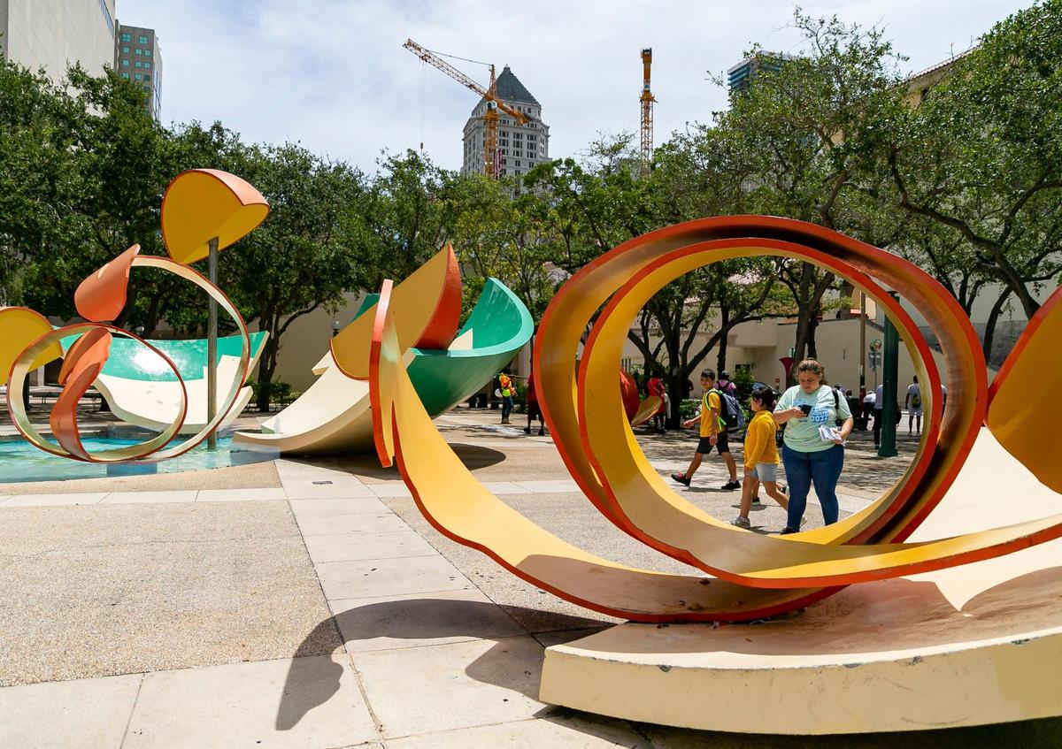 Miami-Dade County is offering public land and buildings surrounding its Stephen P. Clark Government Center tower to developers as part of a plan to create a new downtown neighborhood. The properties up for bid include the plaza that’s home to Claes Oldenburg and Coosje van Bruggen’s “Dropped Bowl with Scattered Slices and Peels” sculpture, which would be moved elsewhere.