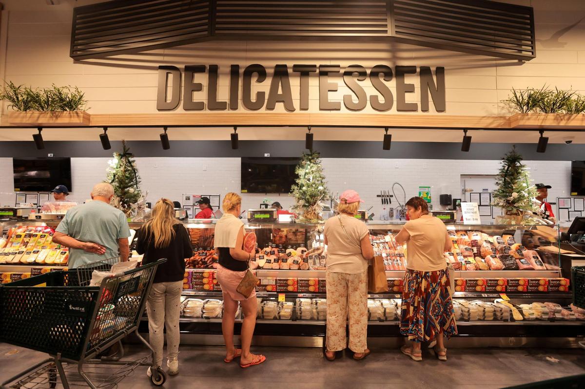 Costumers shop for deli meets at NetCost Market in Hollywood, Florida, on Thursday, Dec. 19, 2024.