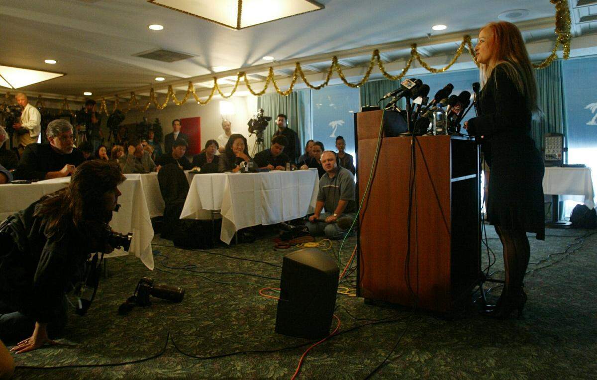 Brigitte Boisselier, a chemist and CEO of Clonaid, talks to reporters in Hollywood, Fla., Friday, Dec. 27, 2002, where she claimed that her company has produced the world’s first human clone, a baby girl. (AP Photo/Hillery Smith Garrison)