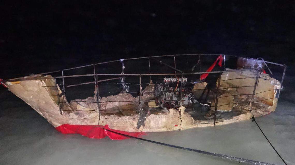 A homemade vessel sits on the shores of Sugarloaf Key in the Lower Florida Keys Thursday, March 31, 2022. One person on the boat was found dead. The six survivors said more from the group of Cuban migrants are missing.