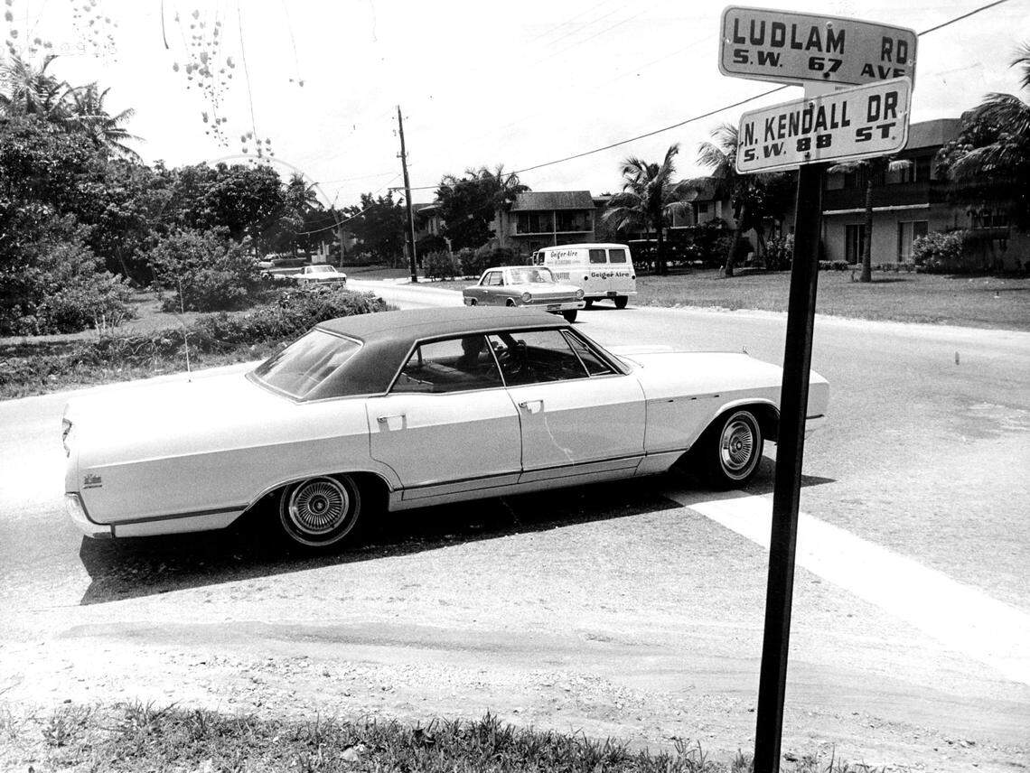A driver enters a Kendall intersection in 1970.