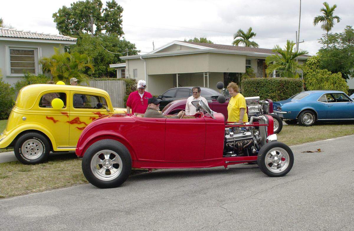 In 2009, Before the rain started Mark Klein takes off in his 1932 Ford Roadster during the annual Citizen’s Crime Watch Black Party in Westchester.