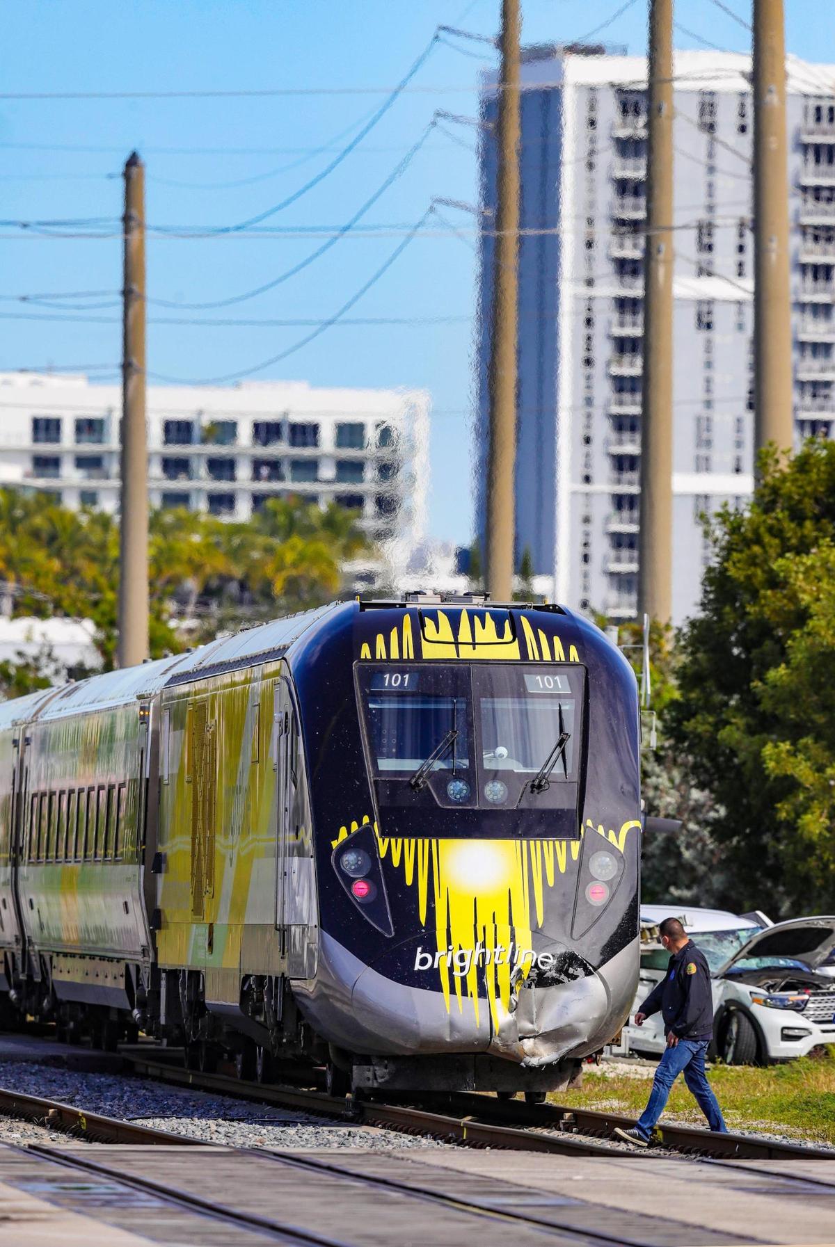 A car on the railroad tracks was struck by a Brightline train on the southeast edge of Miami’s Wynwood area on Thursday, Jan. 13, 2022.