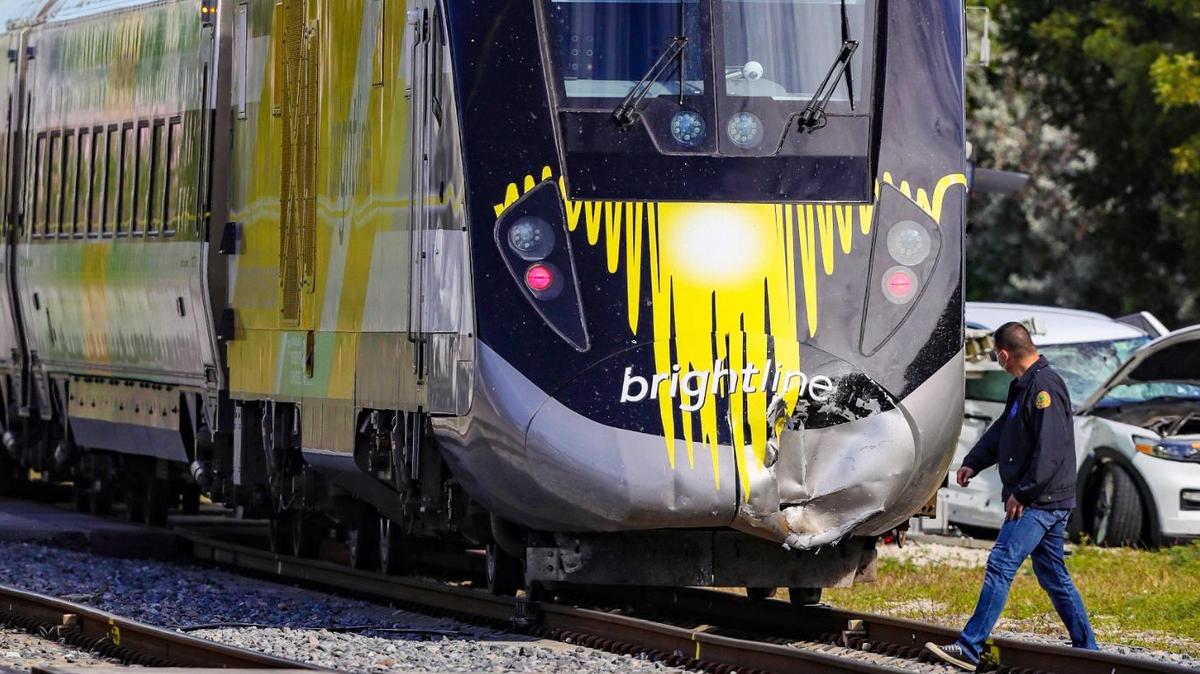 A car on the railroad tracks was struck by a Brightline train on the southeast edge of Miami’s Wynwood area on Thursday, Jan. 13, 2022.