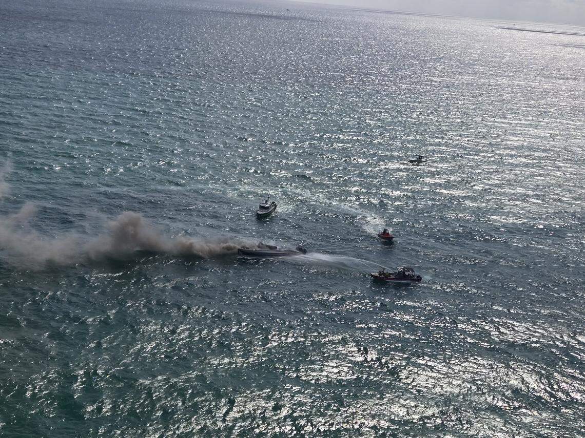 A 40-foot boat caught fire off Miami Beach near Collins Avenue; fireboats and a helicopter extinguished the blaze and rescued all aboard with no injuries.