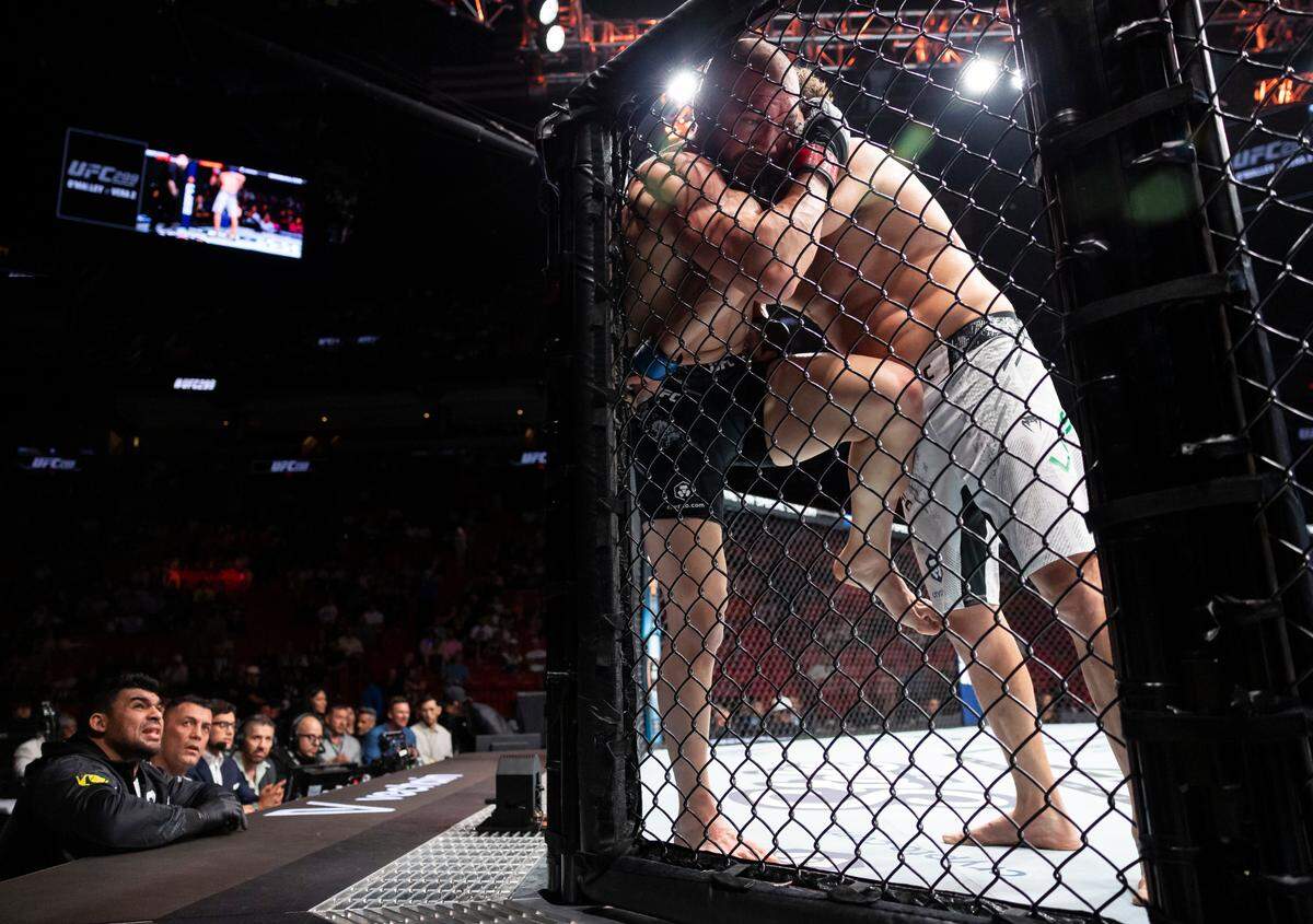 Ion Cutelaba from Moldova fights against Philipe Lins of Brazil during their light heavyweight title match during the UFC 299 event at the Kaseya Center on Saturday, March 9, 2024, in downtown Miami, Fla.