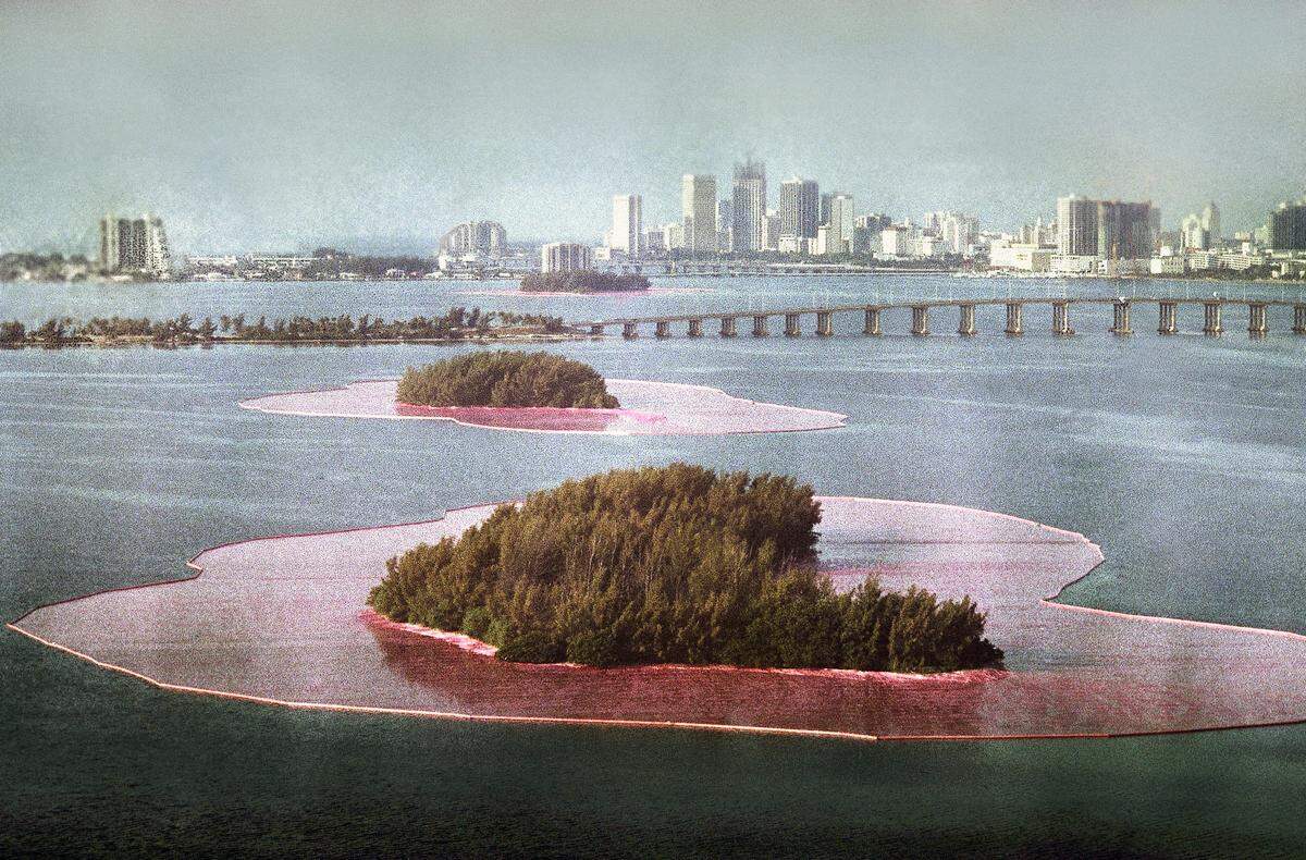 Christo's 'Surrounded Islands' in Biscayne Bay, photographed from the air on May 9, 1983, with downtown Miami in the background.