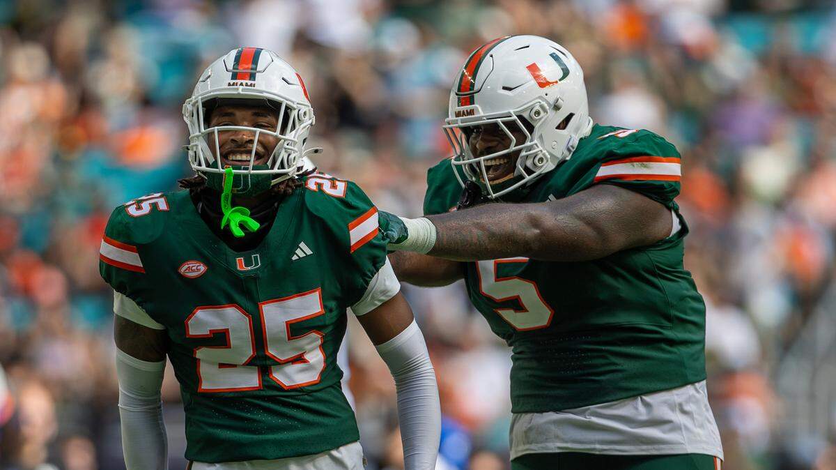 Miami Hurricanes defensive back Jadais Richard (25) and Hurricanes defensive lineman C.J. Clark (5) reacts after a play during the first half of an ACC football game against the Duke Blue Devils at Hard Rock Stadium on Saturday, Nov. 2, 2024, in Miami Gardens, Fla.