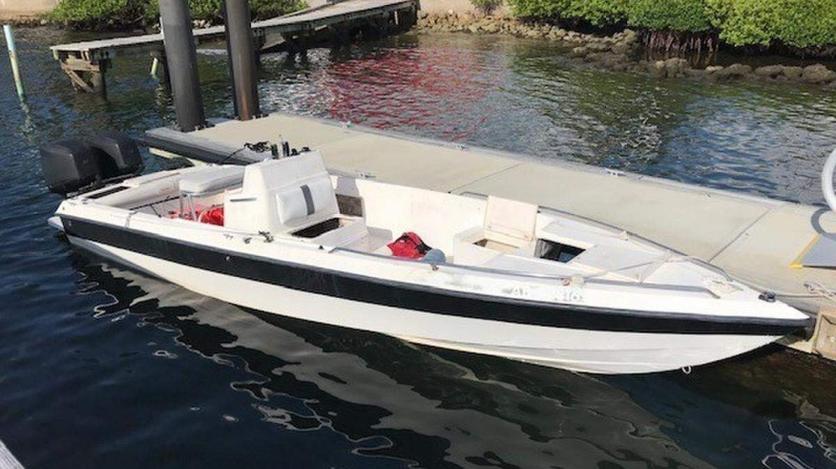 Pictured is a 25-foot boat moored near Delray Beach on July 16, 2020. Coast Guard and Customs and Border Patrol law enforcement teams halted the illegal voyage carrying 23 Haitian migrants.