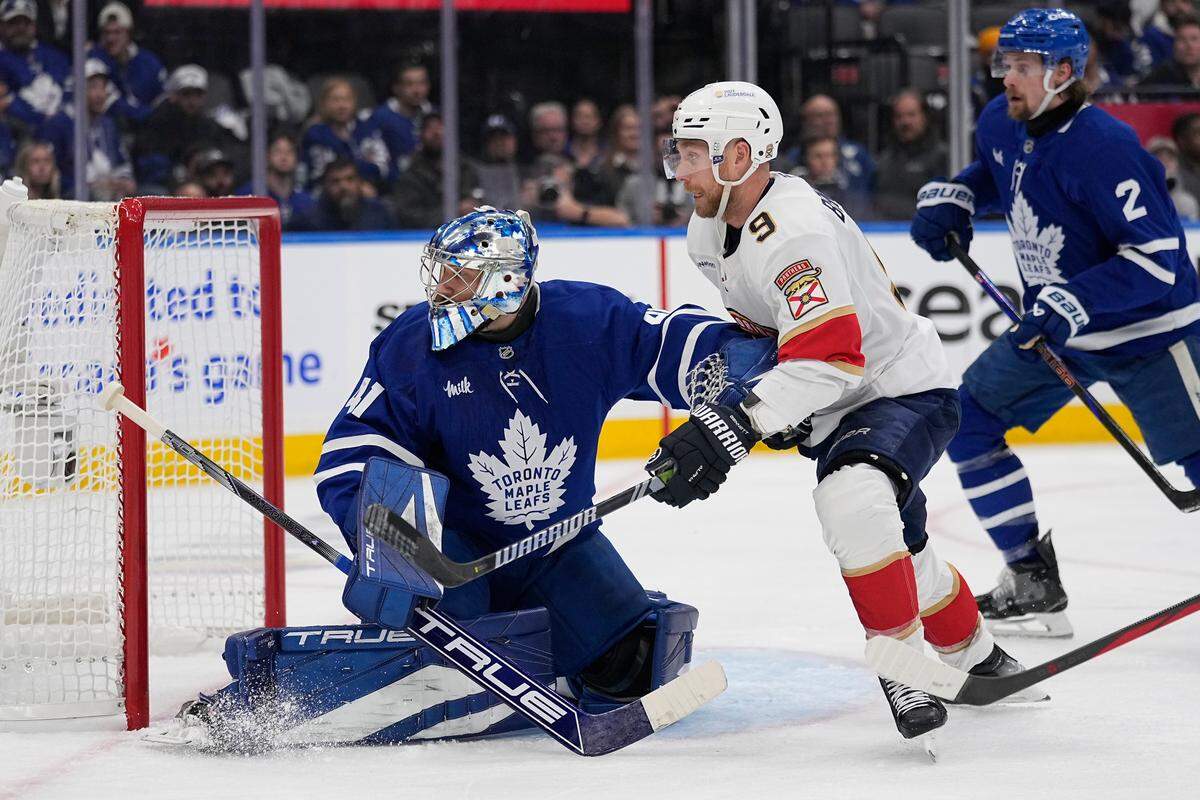 May 5, 2025; Toronto, Ontario, CAN; Toronto Maple Leafs goaltender Anthony Stolarz (41) and Florida Panthers forward Sam Bennett (9) battle for position in front of the goal during the second period of the second round of the 2025 Stanley Cup Playoffs at Scotiabank Arena.
