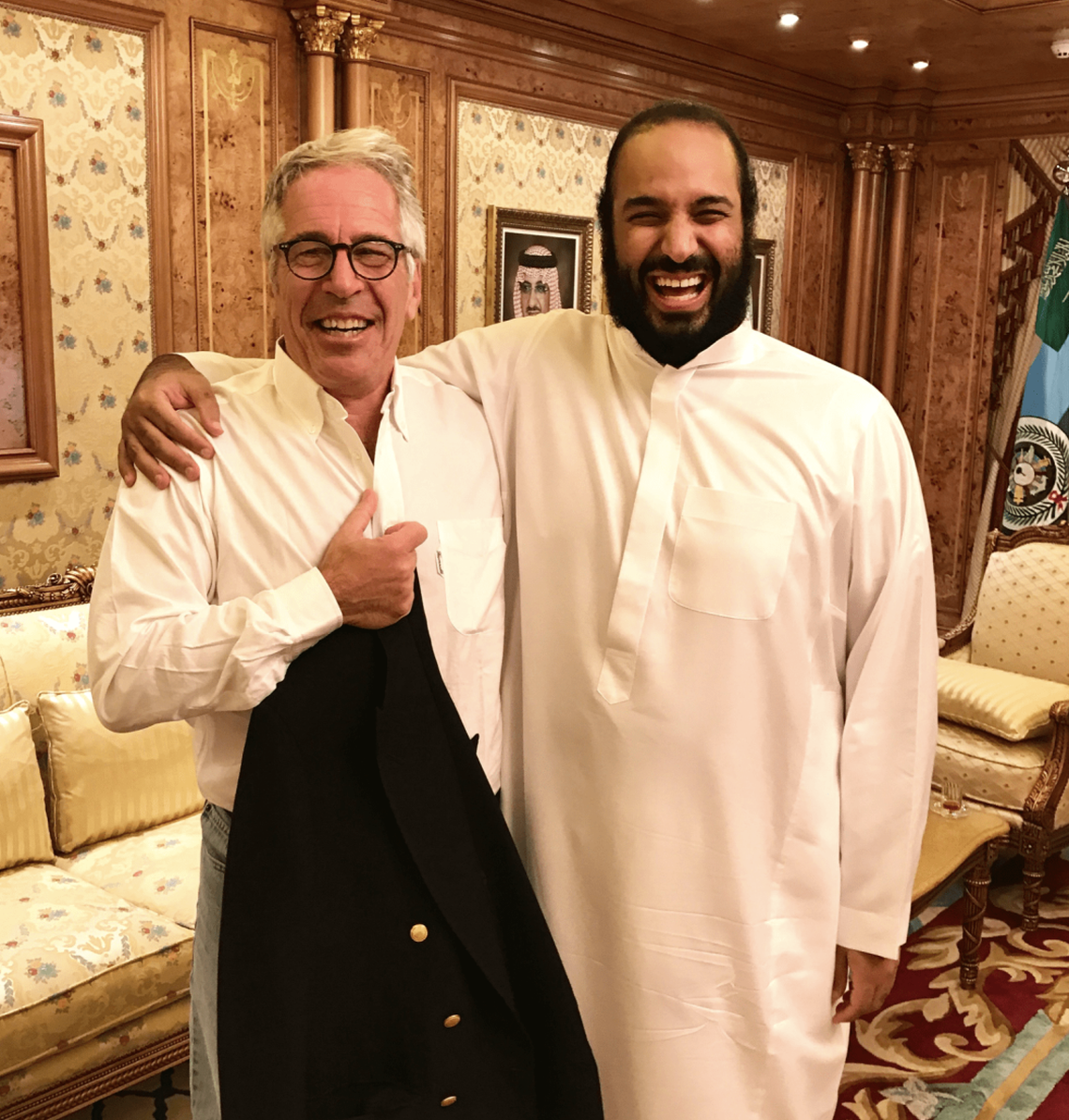 An undated photo released by the U.S. Justice Department appearing to show Jeffrey Epstein (L) with Crown Prince Mohammed bin Salman (R) of Saudi Arabia.