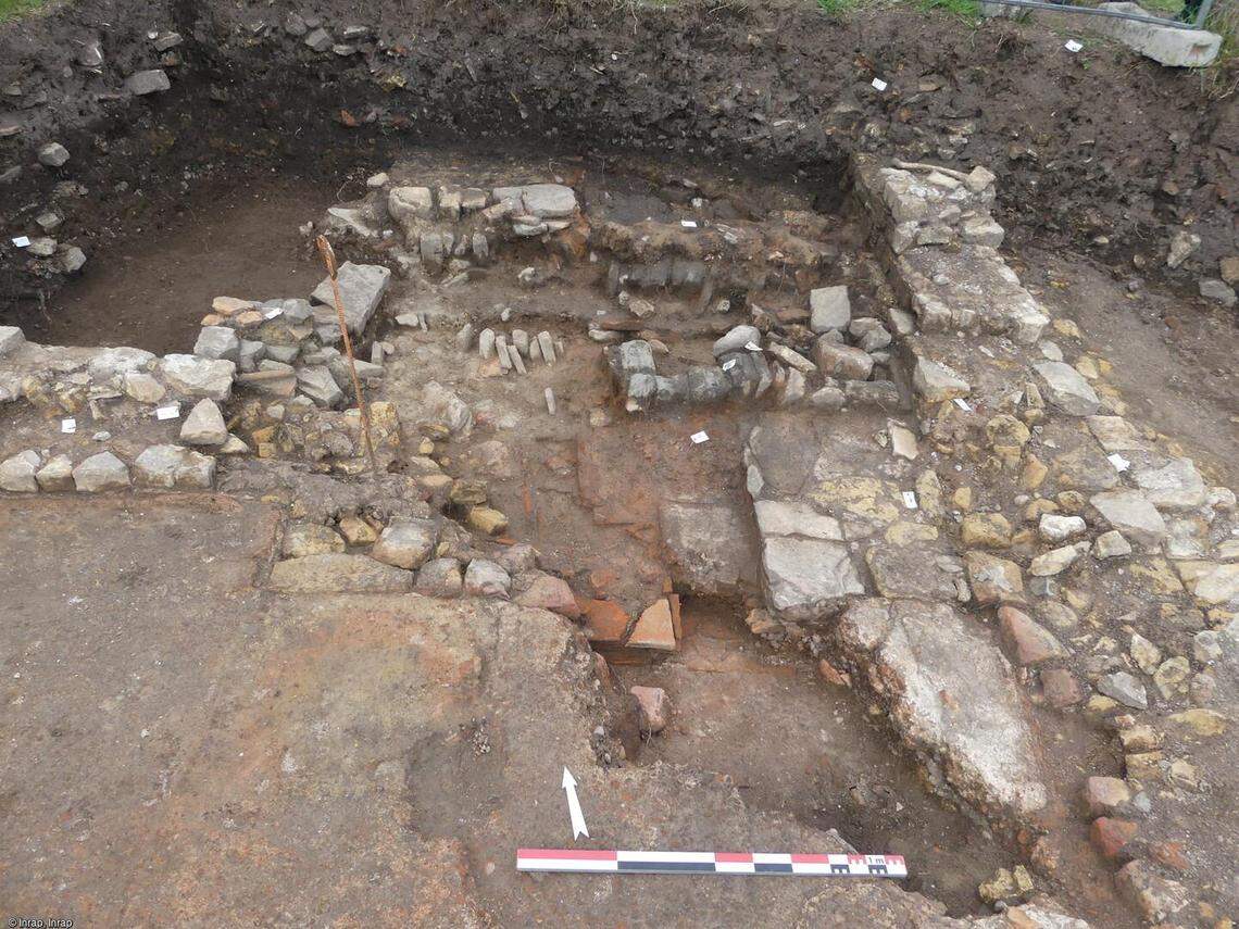 The furnace room used to heat the bathhouse. Overlapping ruins show the room was rearranged several times.