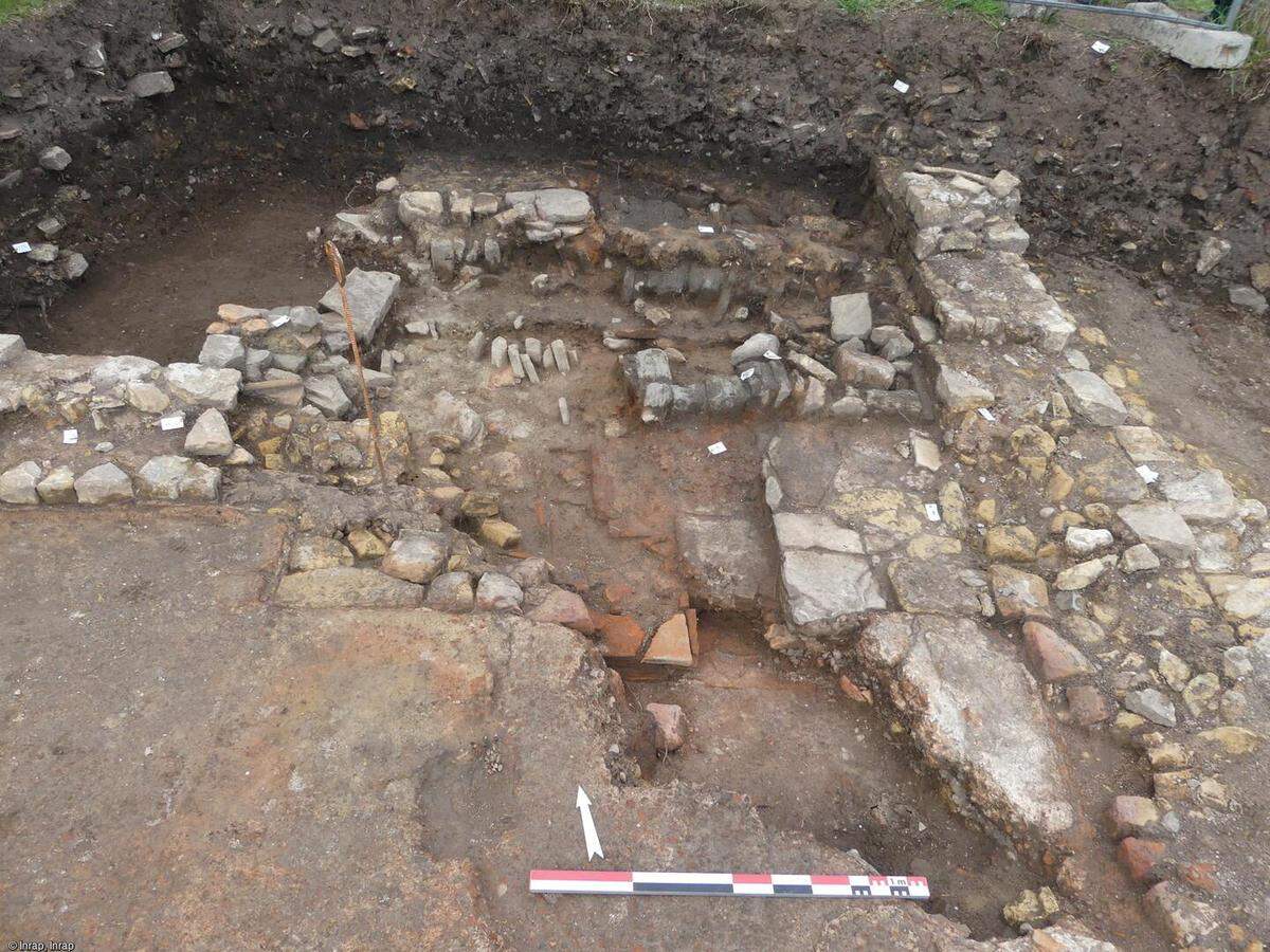 The furnace room used to heat the bathhouse. Overlapping ruins show the room was rearranged several times.