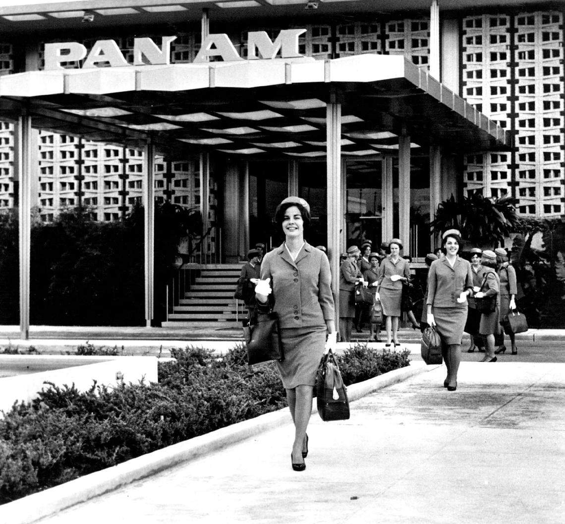 IN JUST A FEW MORE HOURS... Completely outfitted, except for the golden wings which will mark them as full-fledged stewardesses, a class of trainees leaves the Pan American Stewardess College at Miami on their final day. In a little while they’ll be back wearing red rose corsages and ready for the speeches, telegrams of congratulations, the pinning on of their wings, and the champagne toasts that a Pan Am stewardess always remembers from her graduation. There may be a few tears, too, as old friends who were new ones five weeks ago, take off for distant parts of the world.