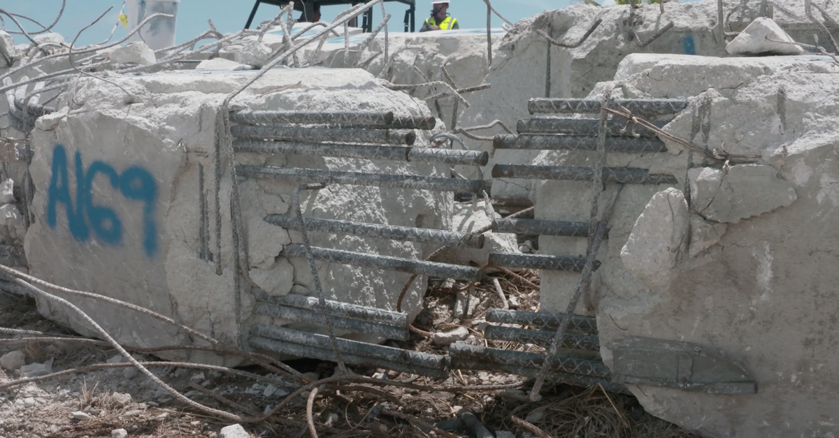 Reinforcing steel shown in a NIST video appeared to be ‘bundled’ in a structural element of Champlain Towers South, potentially weakening its bond to the concrete, experts said. This is a screen capture from the video.