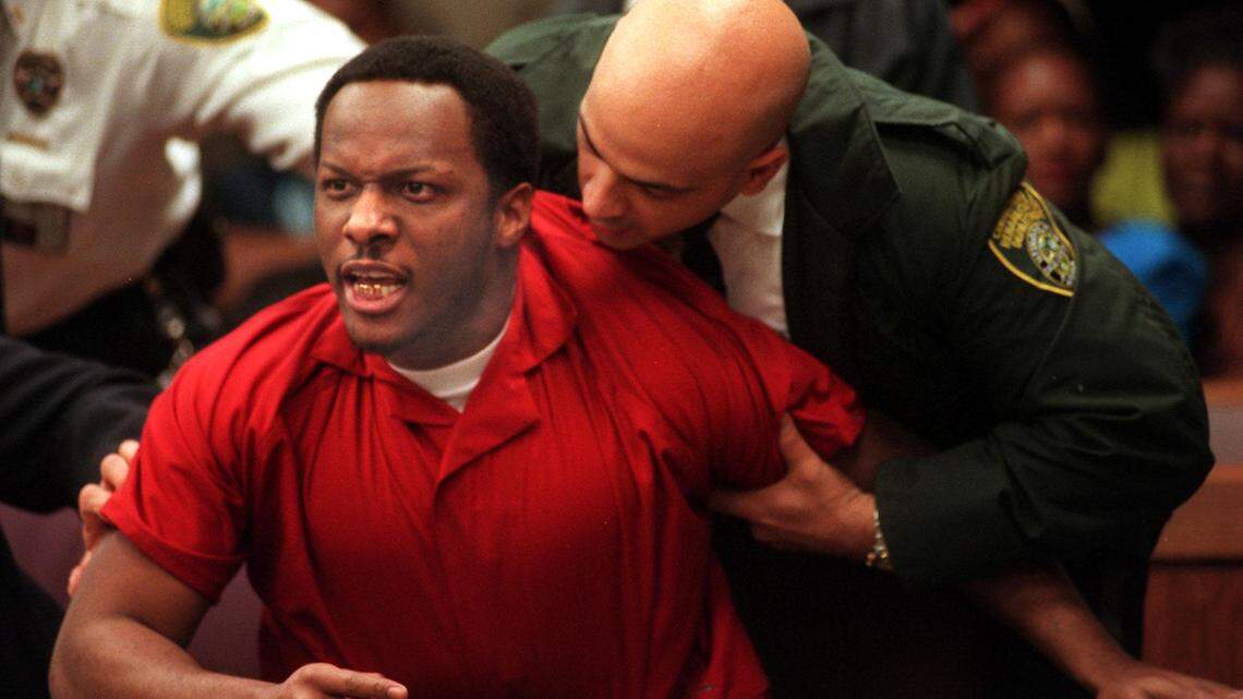 Labrant Dennis lost his temper and had to be restrained, as he listened to Dekiesha Williams address the court in the slayings of Timwanika Lumpkins and Marlin Barnes. The judge sentenced him to death.