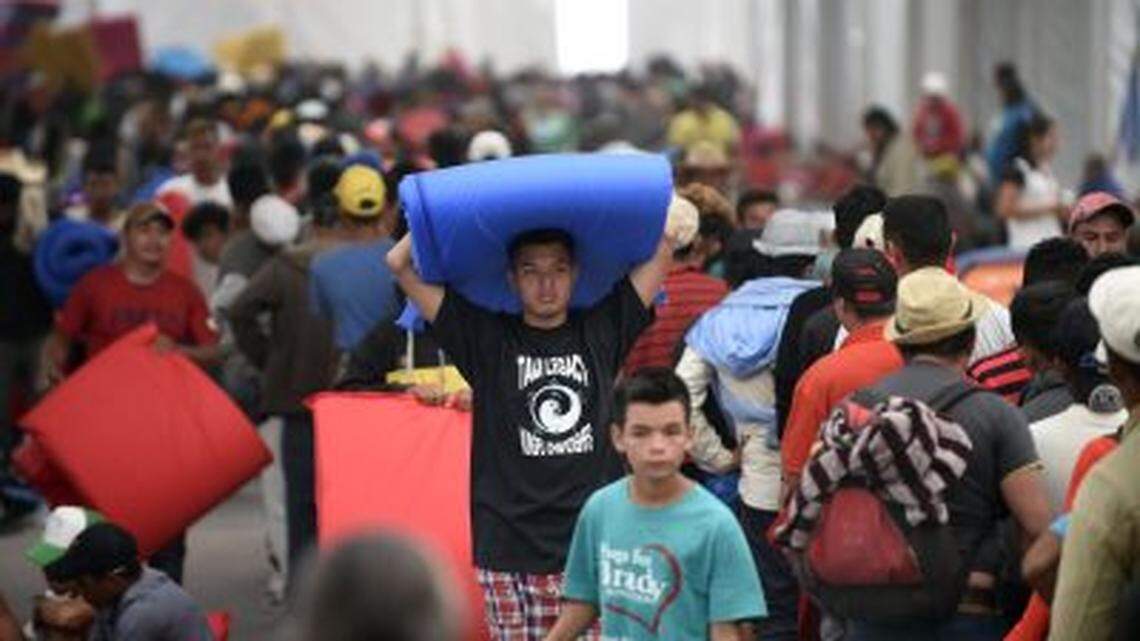 Central American migrants — mostly Hondurans — in a caravan heading to the United States, arrive at a temporary shelter set up in a stadium in Mexico City in November.