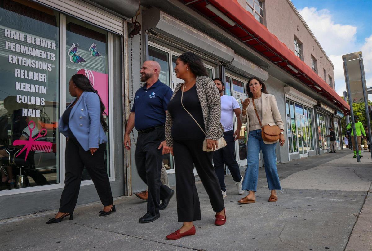 Isiaa Jones, Omni CRA executive director, left; Damian Pardo, District 2 commissioner and Omni CRA chairman; Mileyka Burgos-Flores, CEO and founder of The Allapattah Collaborative CDC; and their staff toured Allapattah on Monday, Sept. 9, 2024, in Miami.