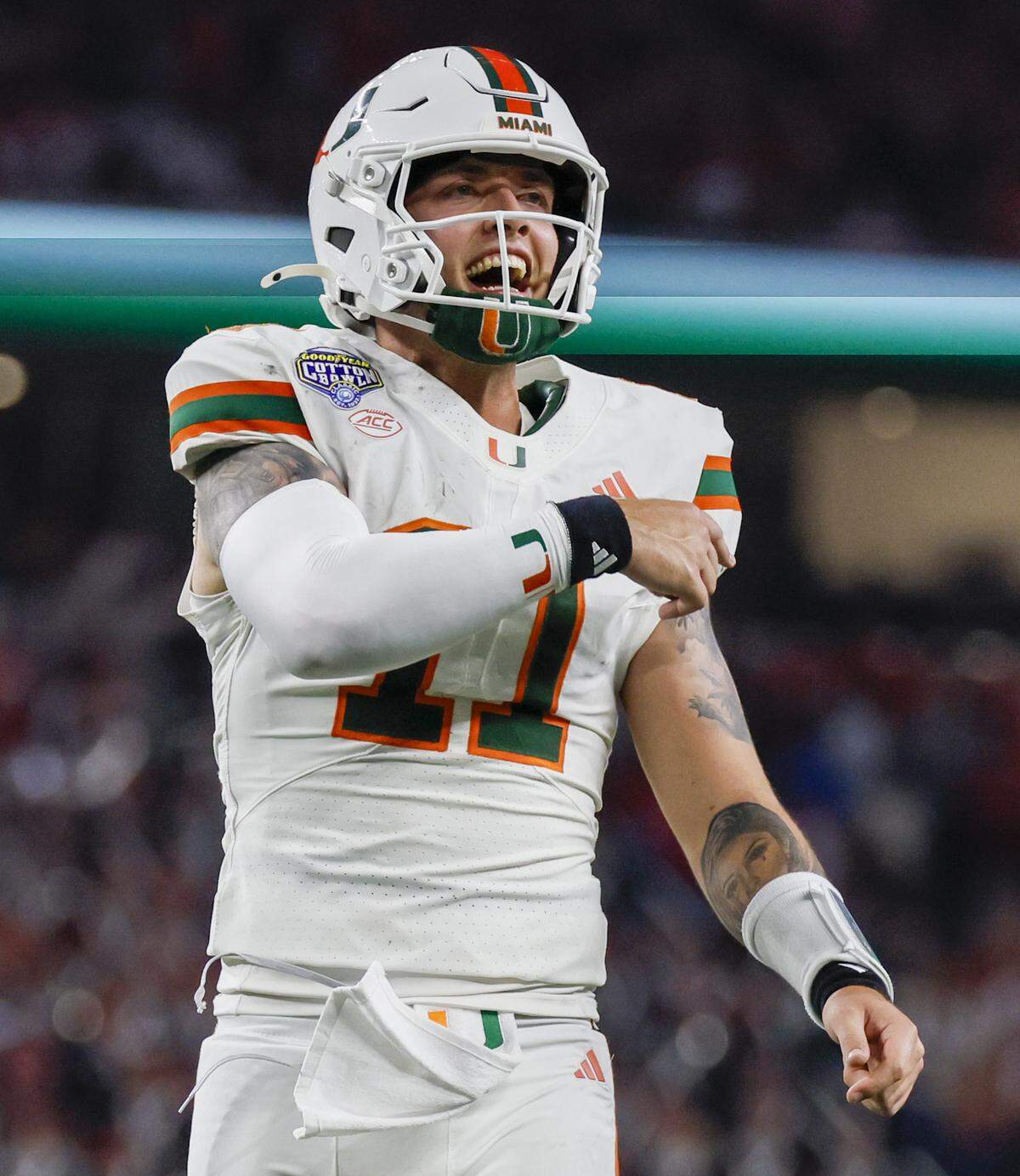 Miami Hurricanes quarterback Carson Beck (11) reacts after the Canes score late in the second half of the College Football Playoff quarterfinal game against the Ohio State Buckeyes in the Cotton Bowl at AT&T Stadium in Arlington, Texas on Wednesday, December 31, 2025.