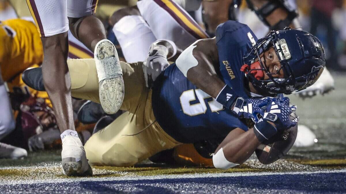 Florida International University Panthers running back Kejon Owens (5) scores against the Bethune Cookman Wildcats in the first half at FIU's Pitbull Stadium in Miami, Florida, on Friday, August 29, 2025.