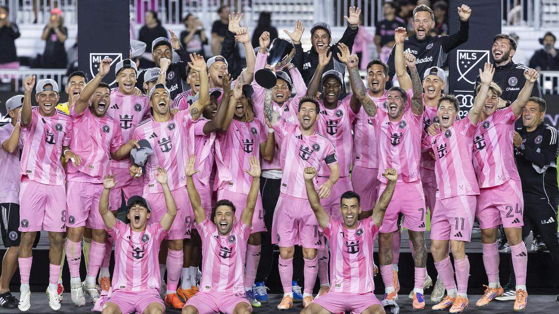 Inter Miami players celebrate with the MLS Eastern Conference final trophy after they defeated New York City FC during their match at Chase Stadium on Saturday, Nov. 29, 2025, in Fort Lauderdale, Fla.