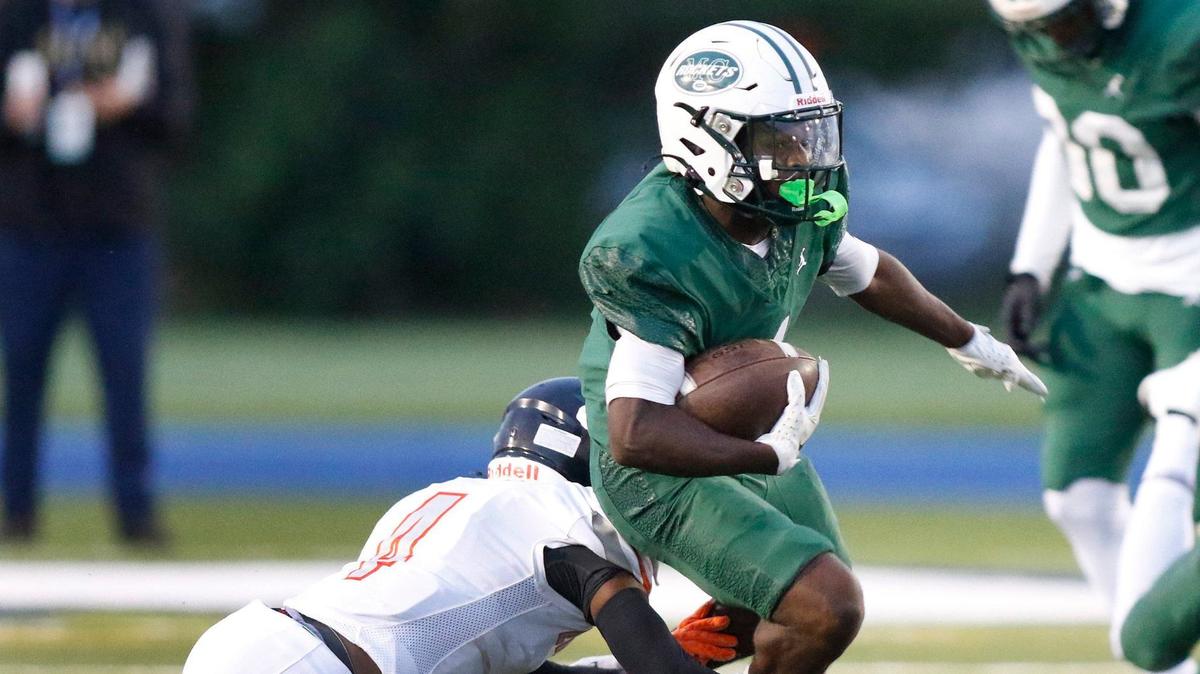 Miami Central running back Jayden Ford carries the ball against Lakeland High during season opener on Friday, August 23, 2024 at Traz Powell Stadium in Miami. Andrew Uloza / for Miami Herald