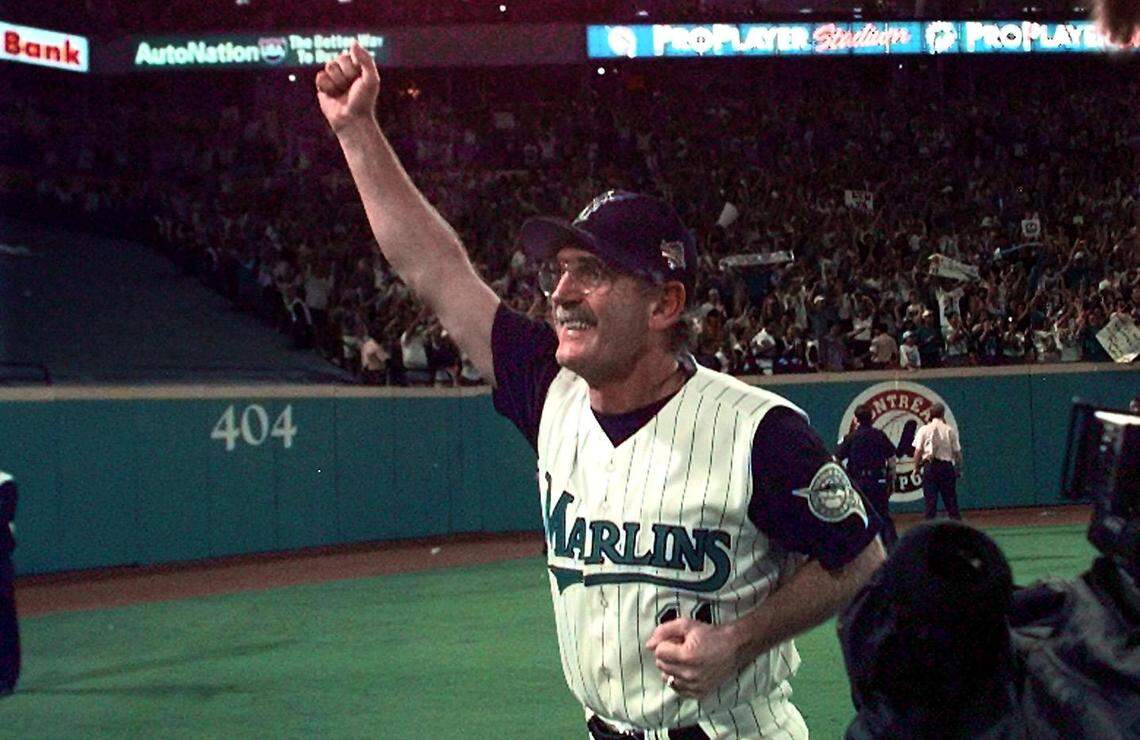 In this Oct. 26, 1997 file photo, Marlins manager Jim Leyland circles the field at Pro Player Stadium after winning the World Series.