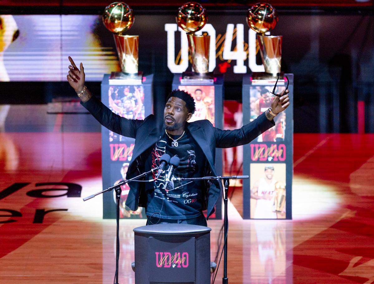 Former Miami Heat forward Udonis Haslem speaks to the audience during a halftime jersey retirement ceremony at Kaseya Center in Miami on Friday, Jan. 19, 2024.