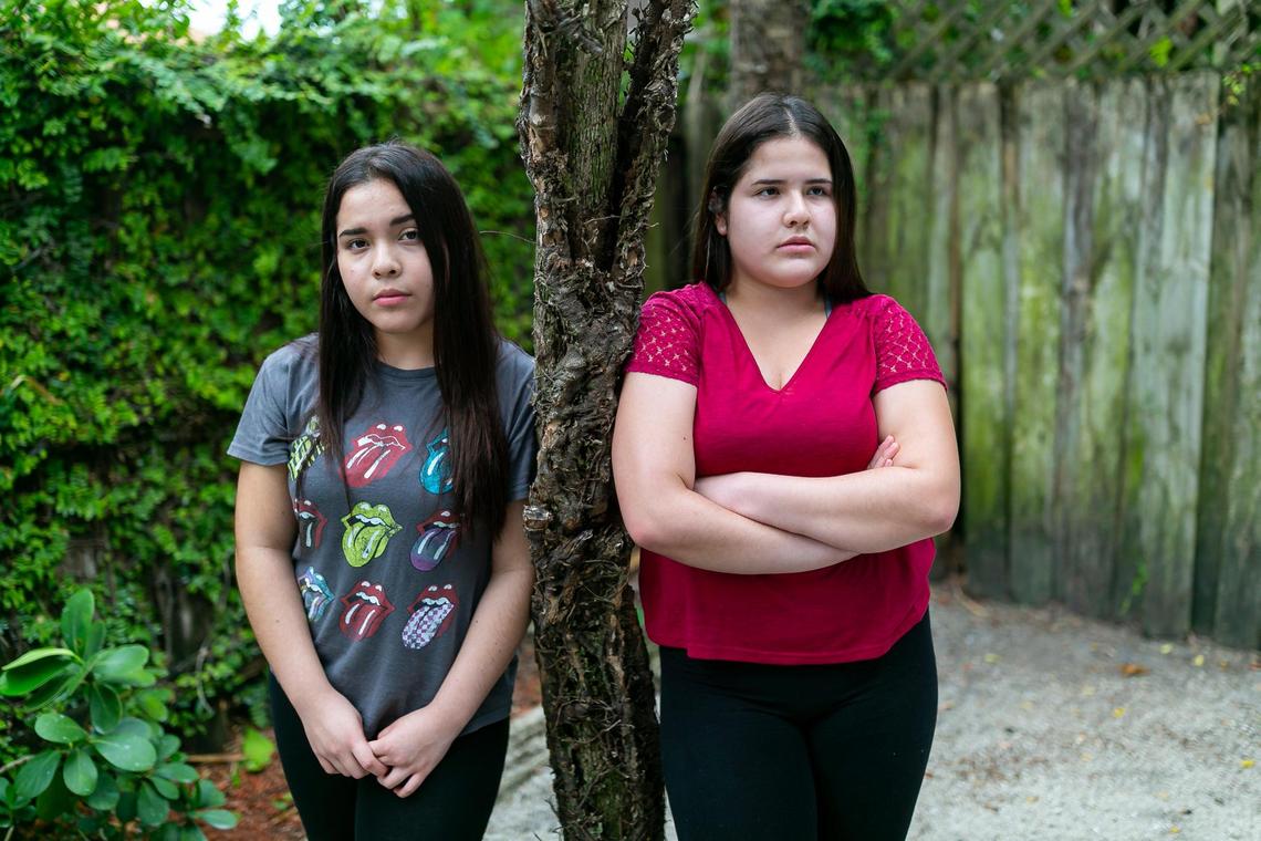 Sisters Isabella Pabon, 17, left, and Sofia Pabon, 15, both students at Coral Gables High School, took classes remotely during the pandemic. Their grandfather passed away from COVID and they had to contend with that loss in addition to being isolated from their classmates.