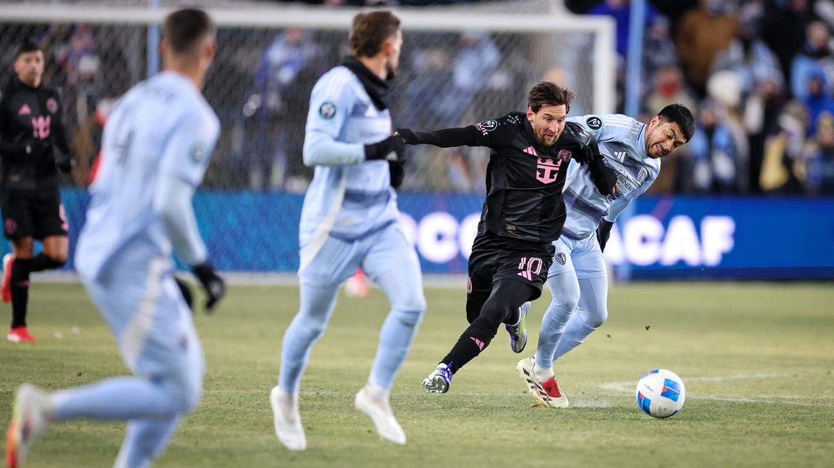 Feb 19, 2025; Kansas City, Kansas, USA; Inter Miami forward Lionel Messi (10) drives up field during the first half against the Sporting Kansas City at Children’s Mercy Park. Mandatory Credit: William Purnell-Imagn Images