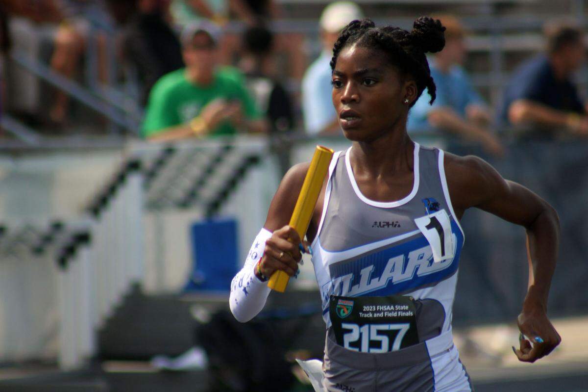 Raquel Edwards of Fort Lauderdale Dillard races in the girls 4x800-meter relay during the FHSAA Class 3A high school track and field championship on May 19, 2023. [Clayton Freeman/Florida Times-Union]